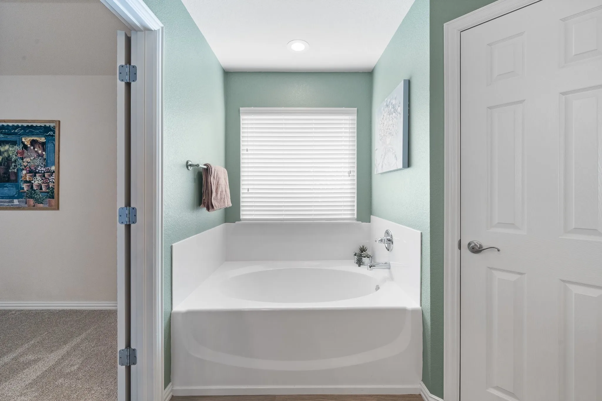 You'll love this Garden tub in the primary bathroom.