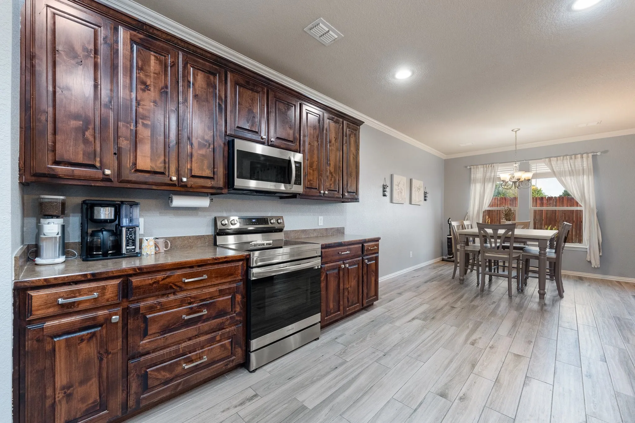 You'll love this kitchen with breakfast area overlooking the beautifully landscaped back yard!