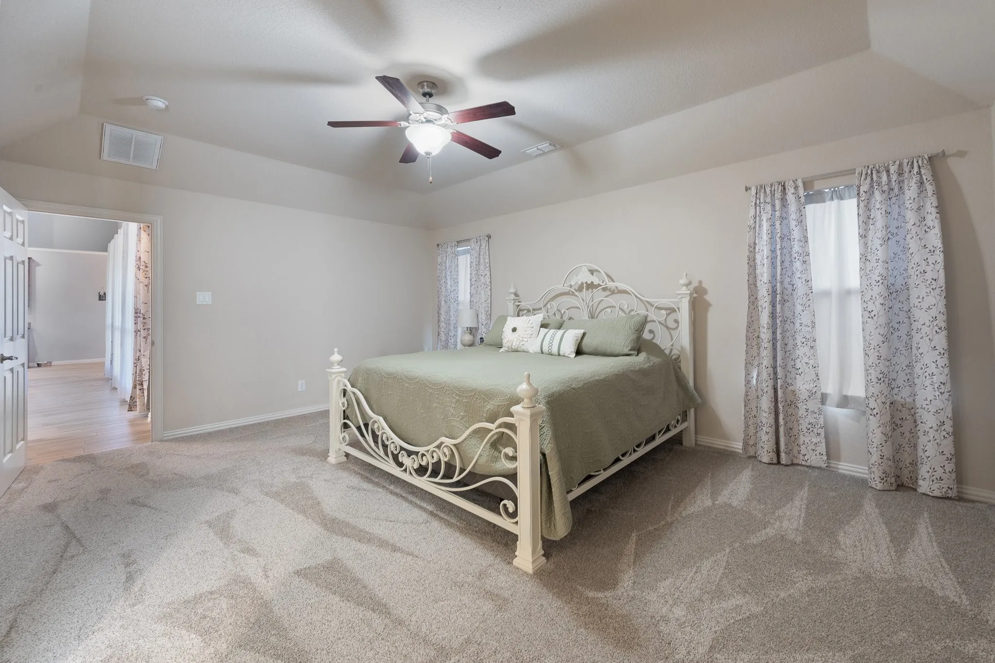 The primary bedroom is split from the other bedrooms. And it's HUGE!