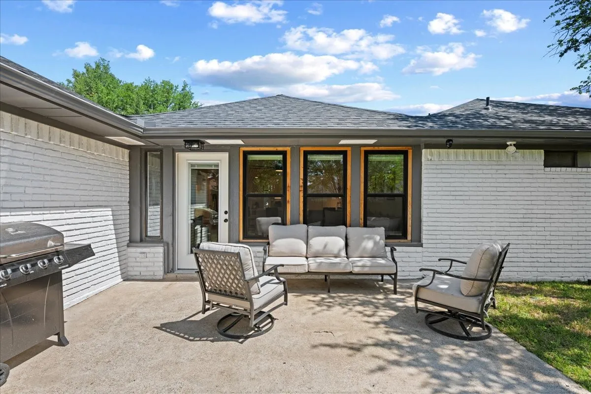 Spacious outdoor patio with a concrete surface
