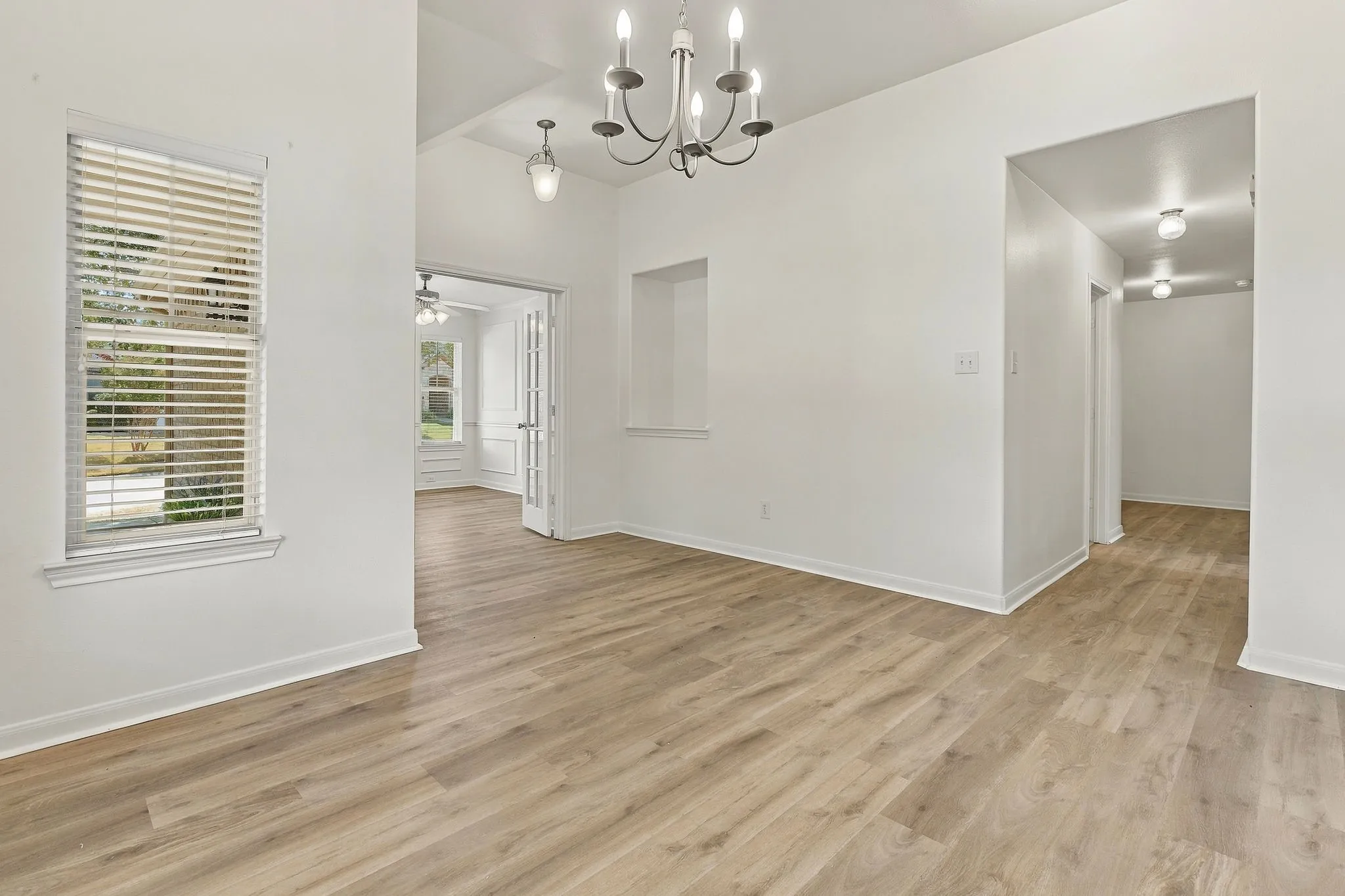 Dining area with view towards office or flex room