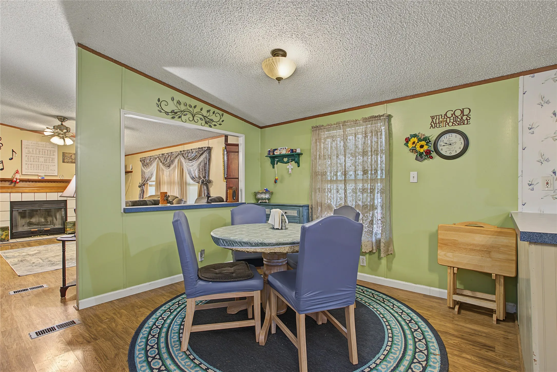 Wood-finish flooring throughout the space