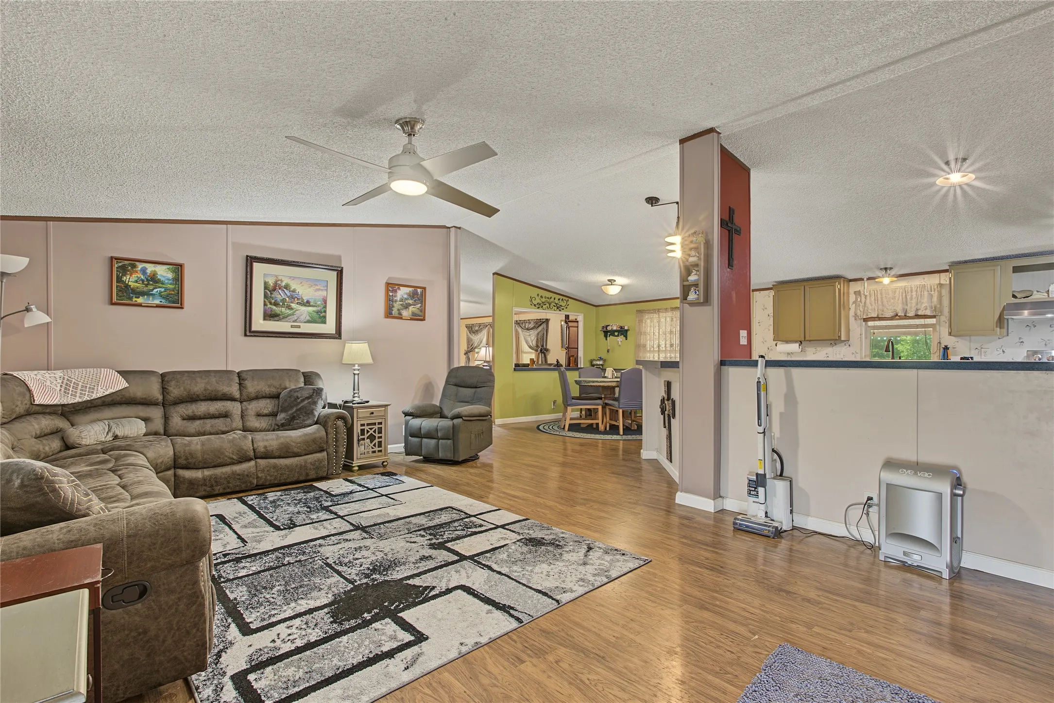 Wood-finish flooring throughout the main living areas