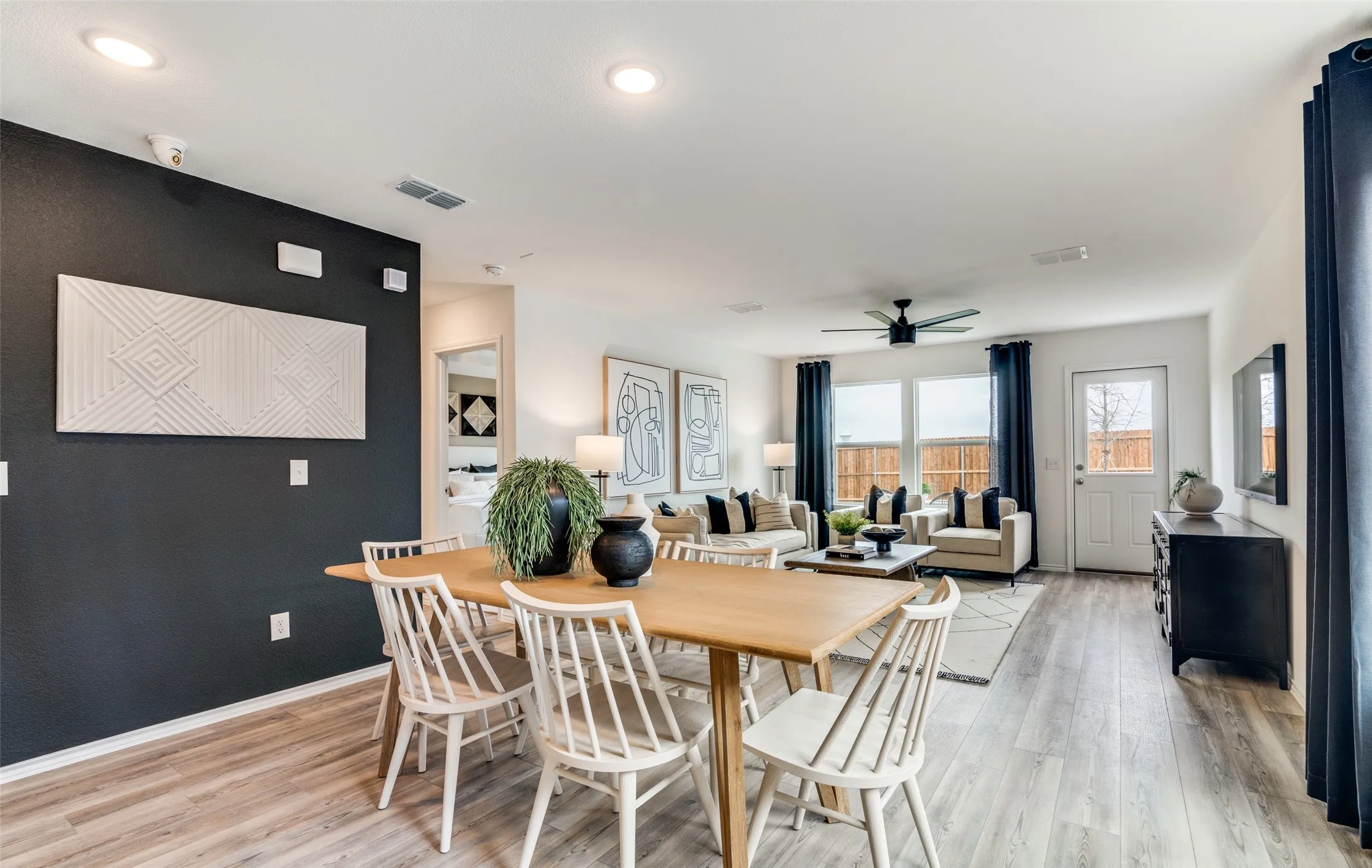 *Model Representation - Dining area off kitchen with large windows