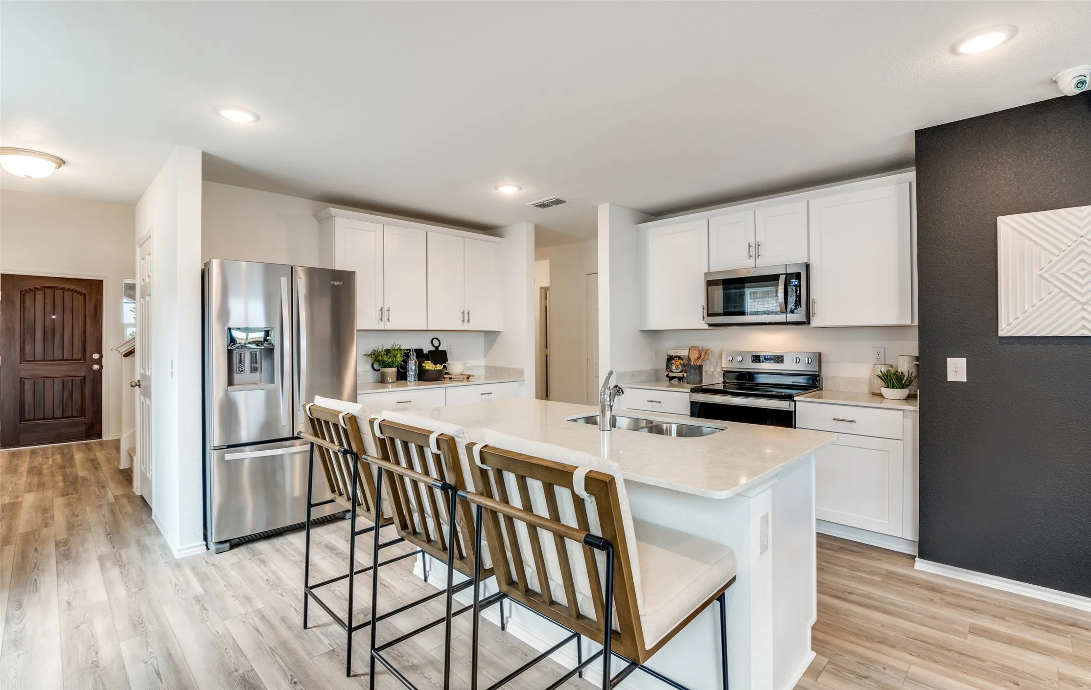 *Model Representation - Spacious kitchen with eat-in bartop island