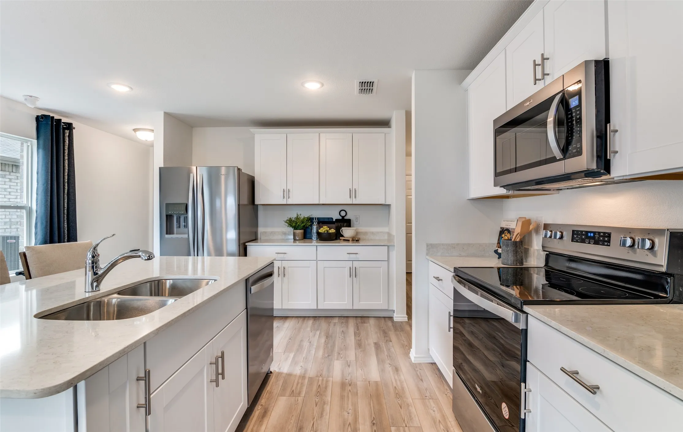 *Model Representation - Abundant cabinet space in kitchen