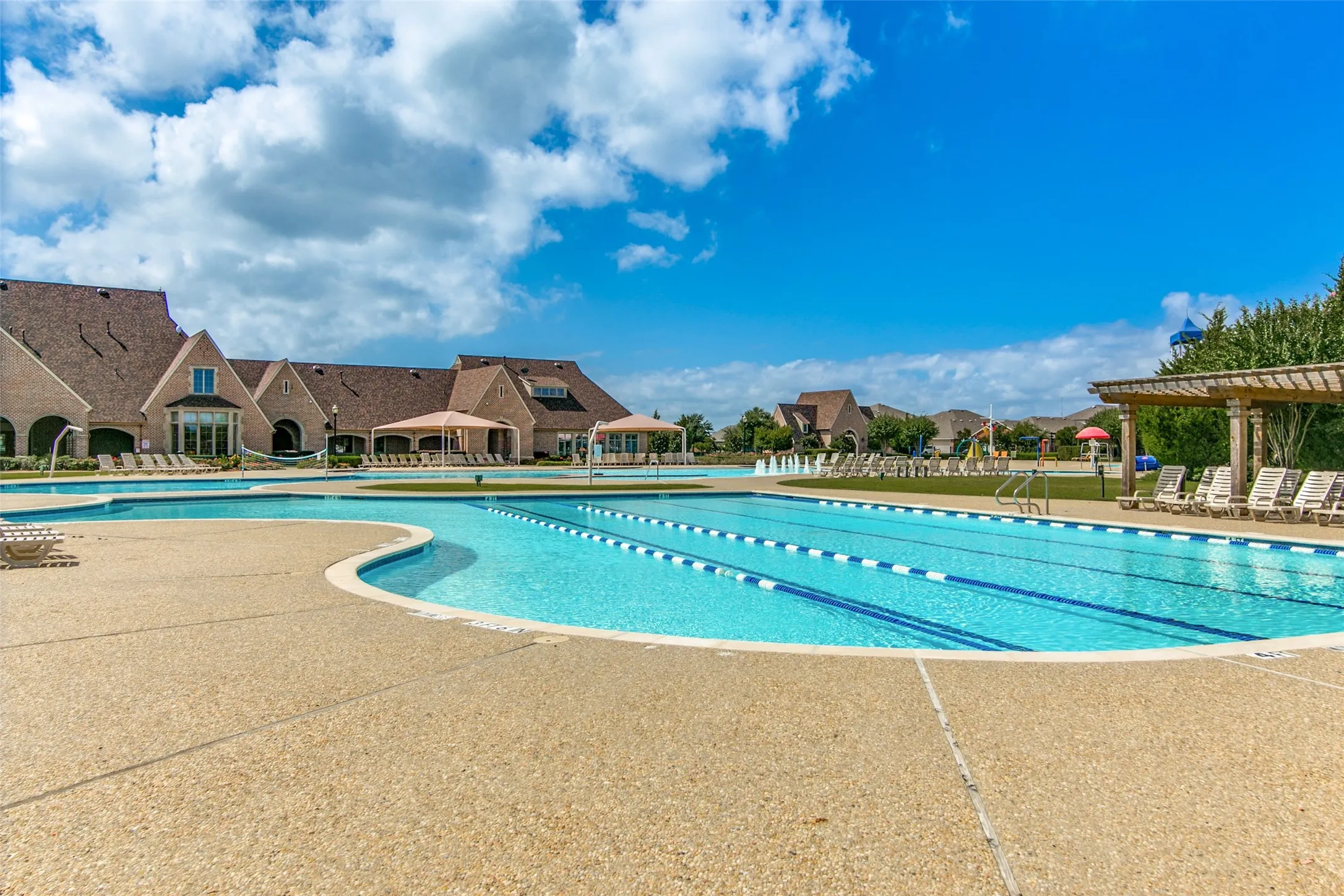 Expansive outdoor swimming pool with dedicated lap lanes
