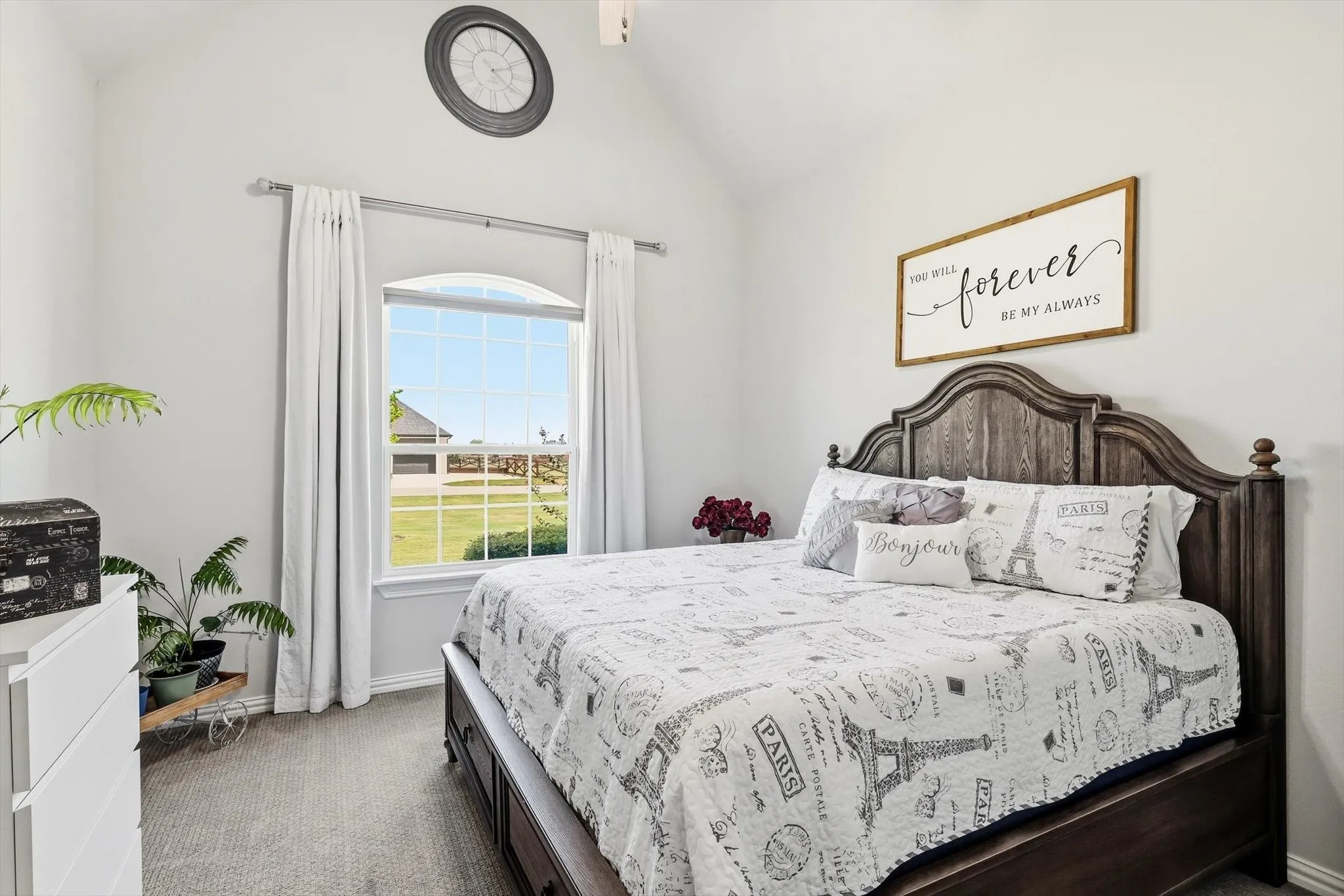 Guest bedroom at front of house is split from the others