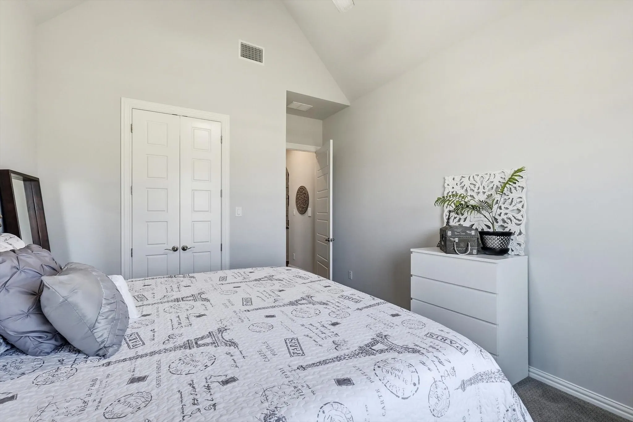 Guest Bedroom has walk-in closet and adjacent bathroom