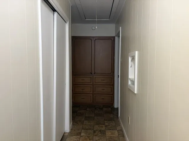 Buit-In Storage and Large Closet in Hall