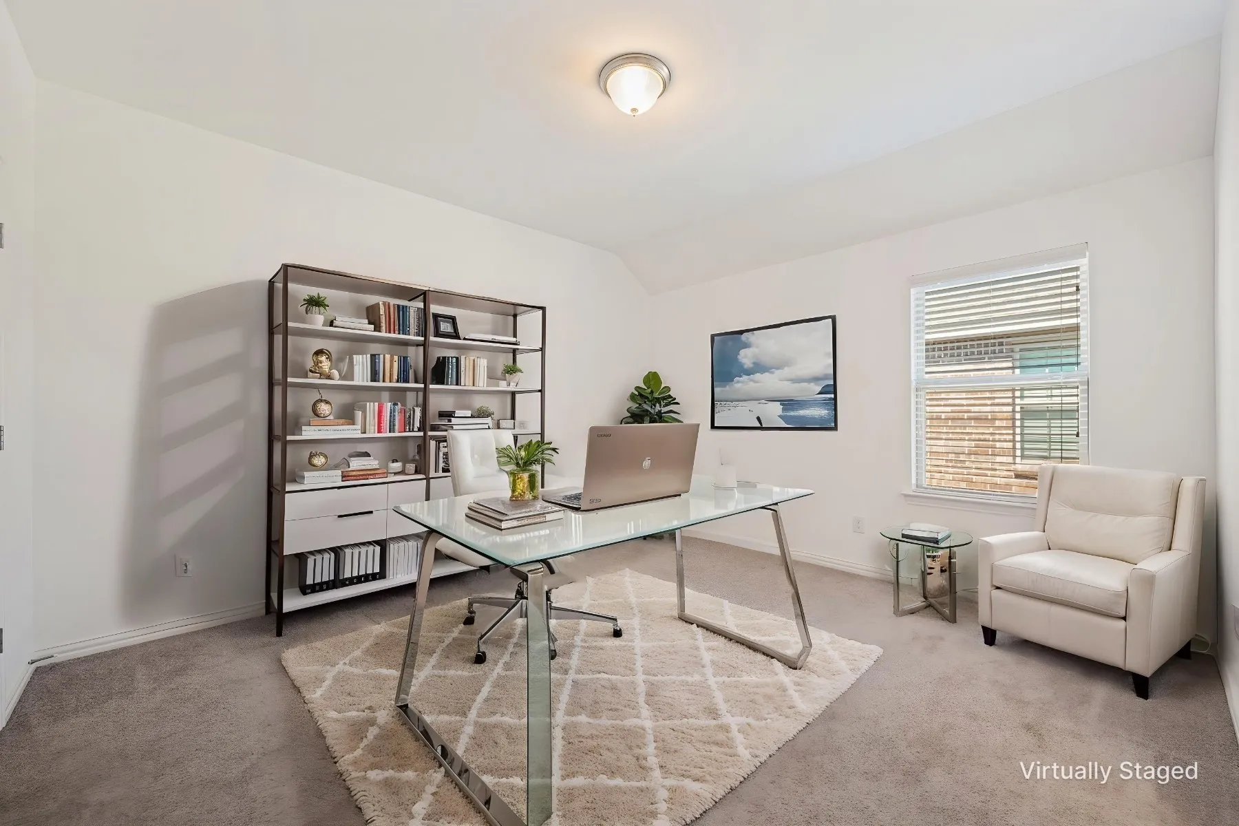 Recessed lighting, carpeted flooring, and a single window with blinds