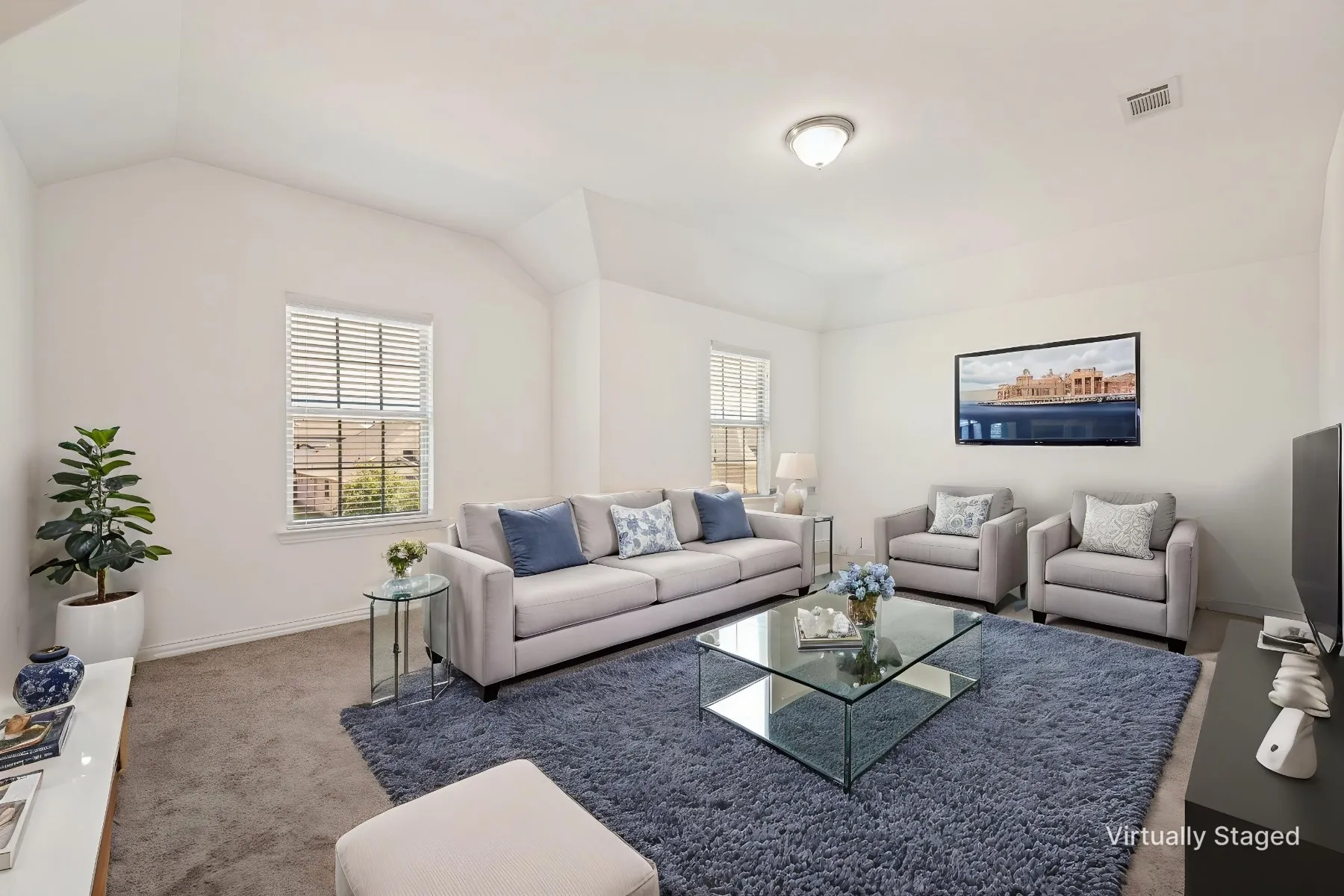 Vaulted ceiling, recessed lighting, double window with blinds, and neutral carpet