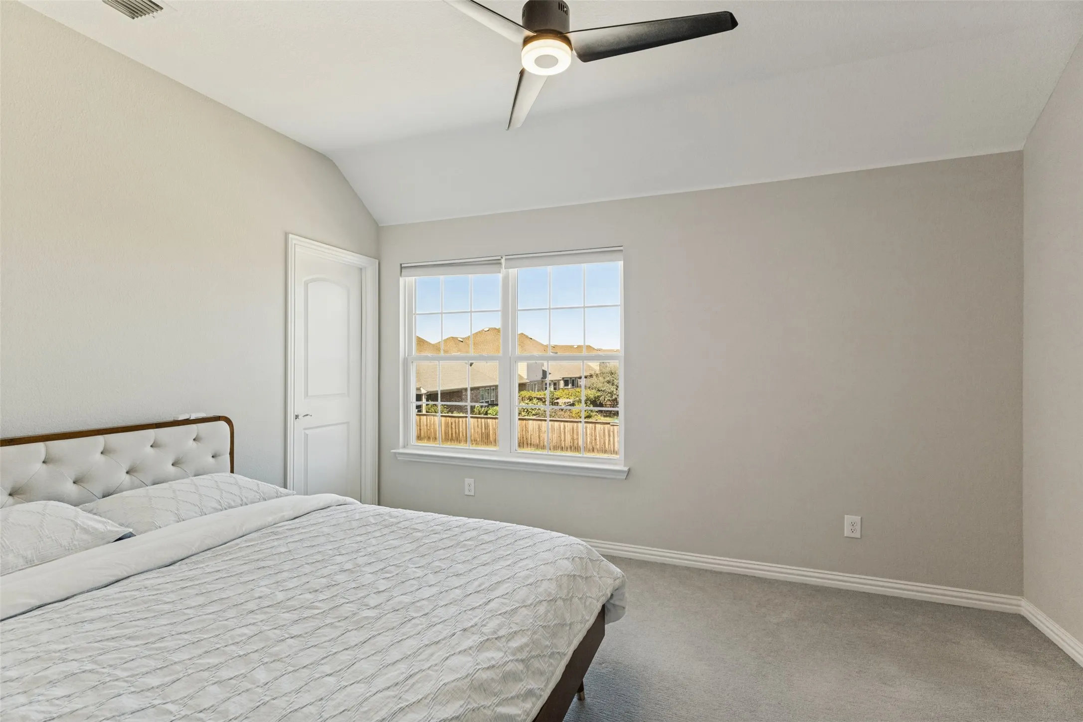 Vaulted ceiling with an attached ceiling fan