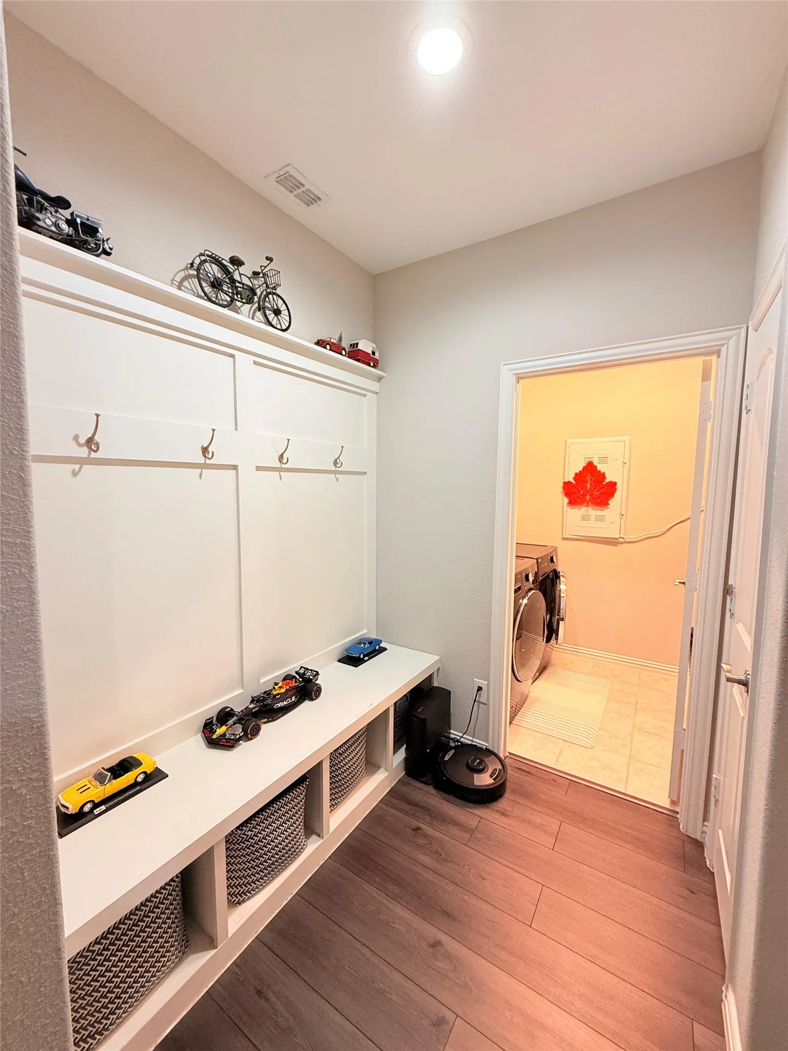 Built-in cabinetry with bench seating and storage cubbies