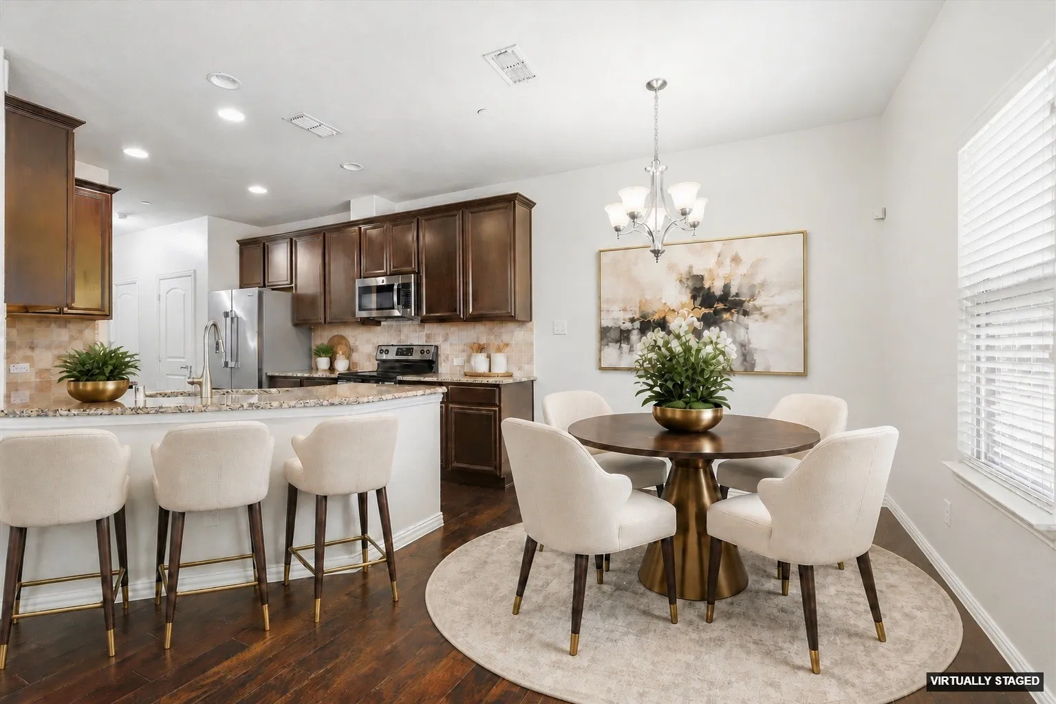 The cozy Breakfast area is ready for you and your morning coffee! (Virtually Staged)