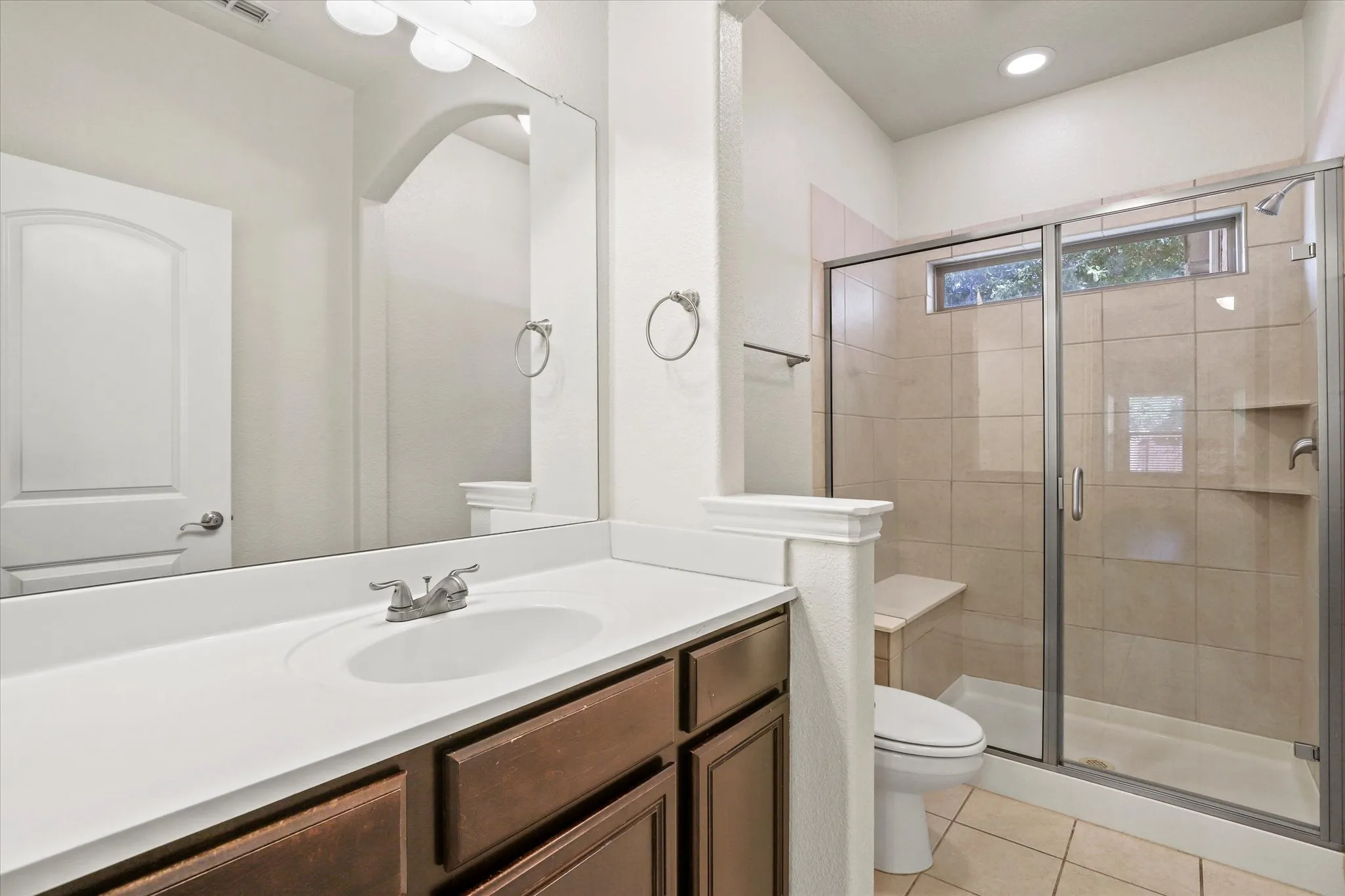 Ensuite bath for Bedroom #2 on the first floor.