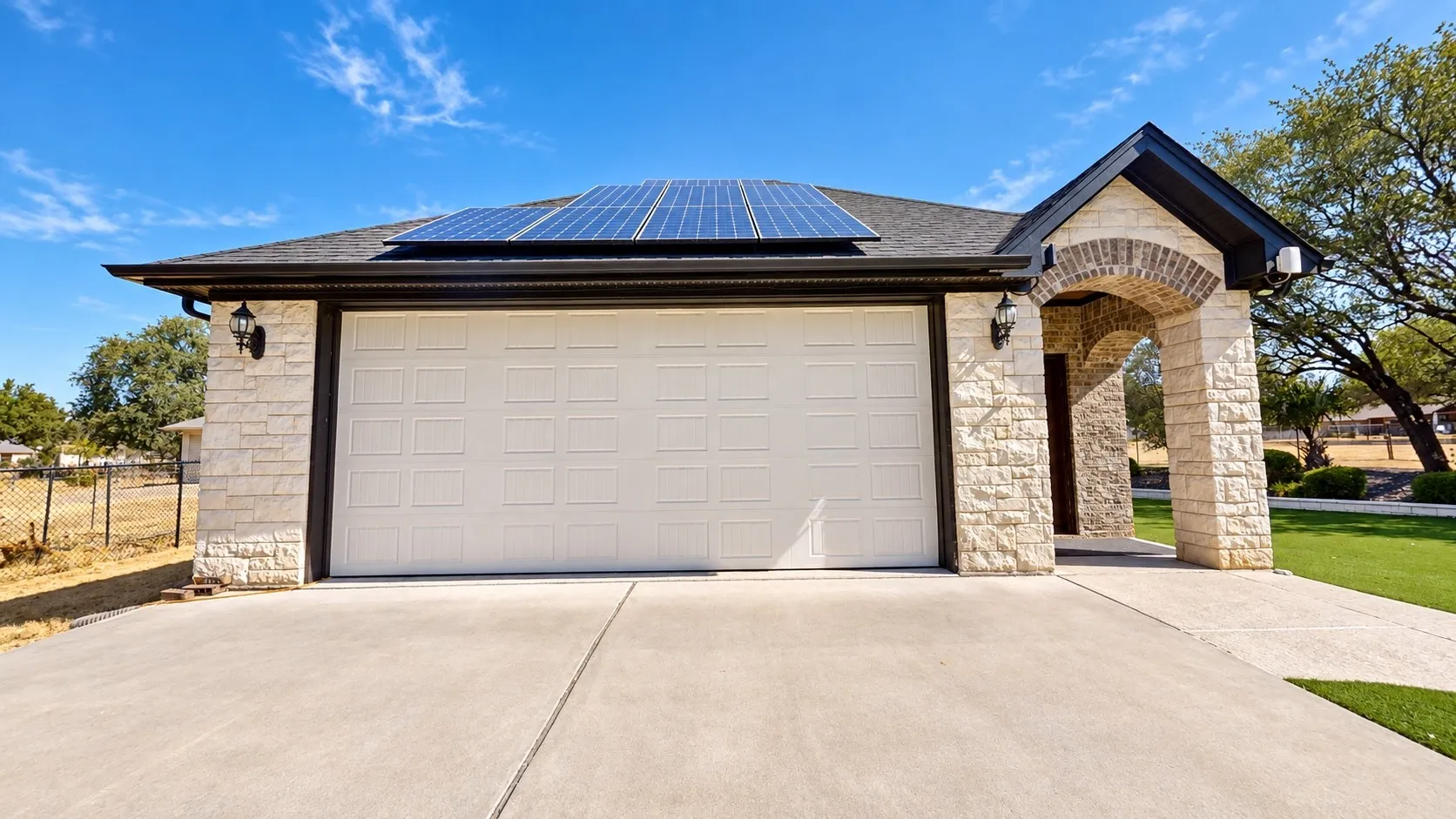 Detached 2-car garage with epoxy flooring, half bathroom, screened garage door, and window AC unit