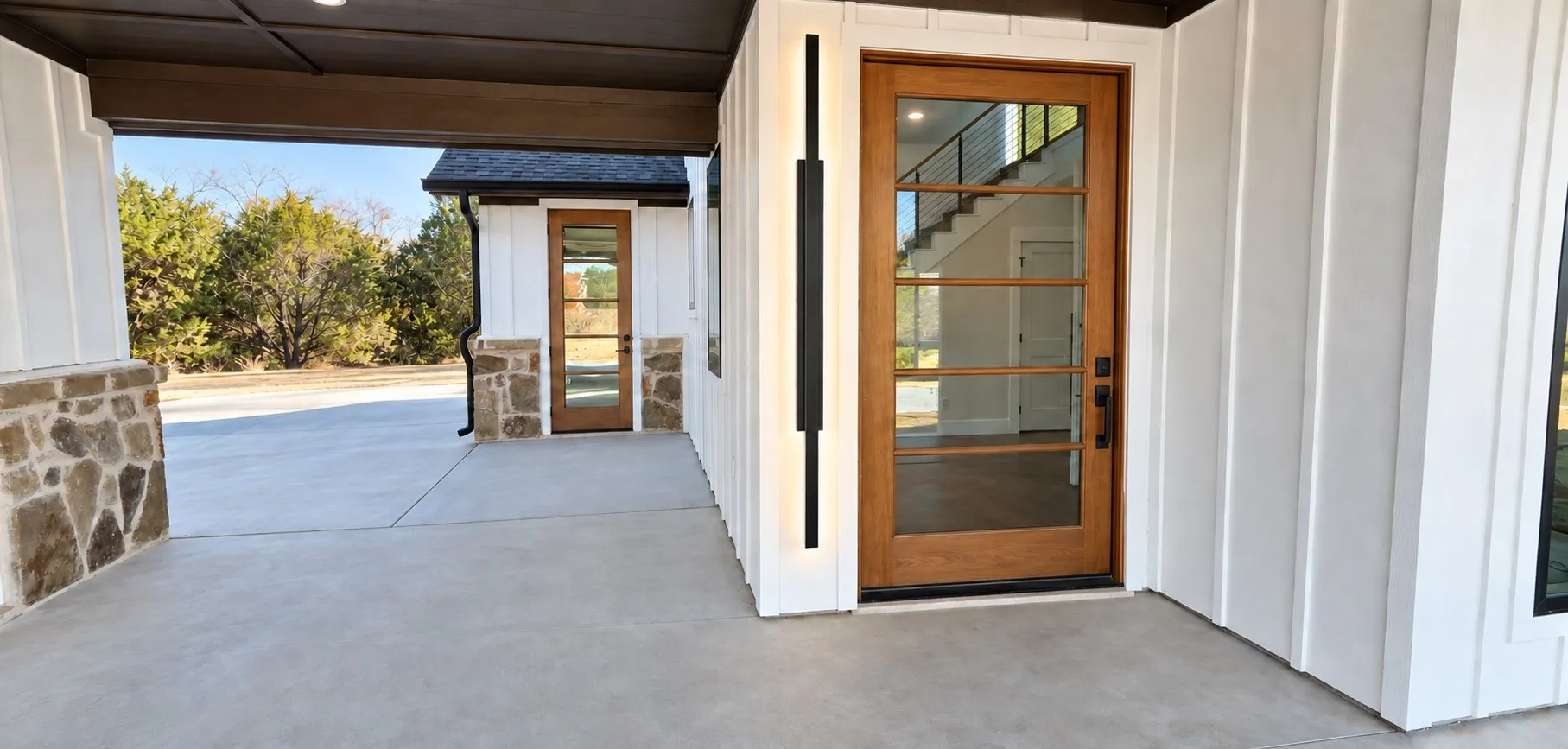 This door! Stately and oversized with easy pull-through access to unload in shade.