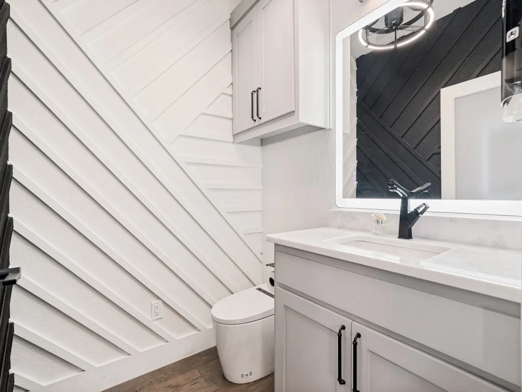 Details matter in this polished half bath.
