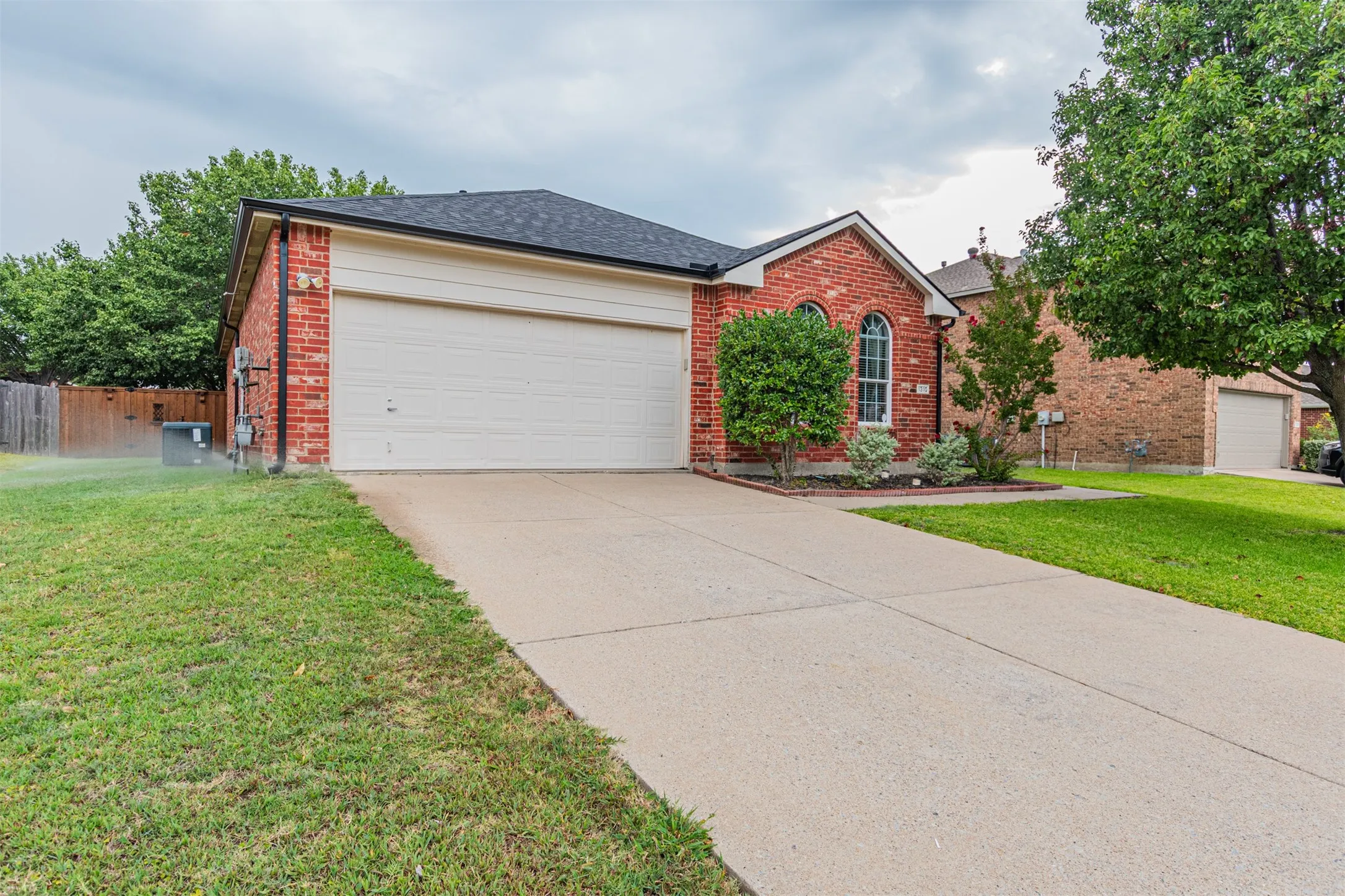 Red brick exterior with white trim