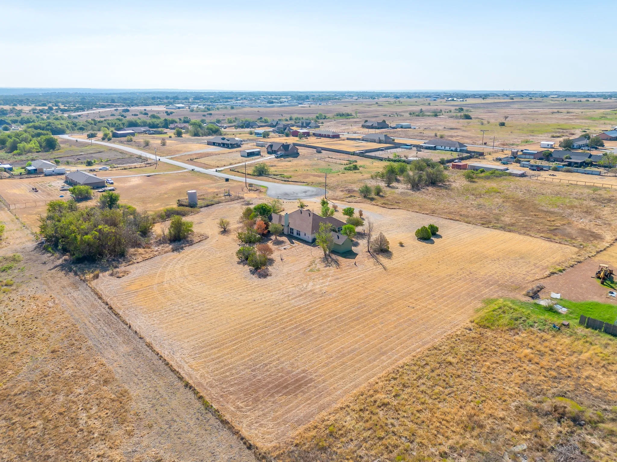 home and 2 mowed acres, adjoining acres not mowed