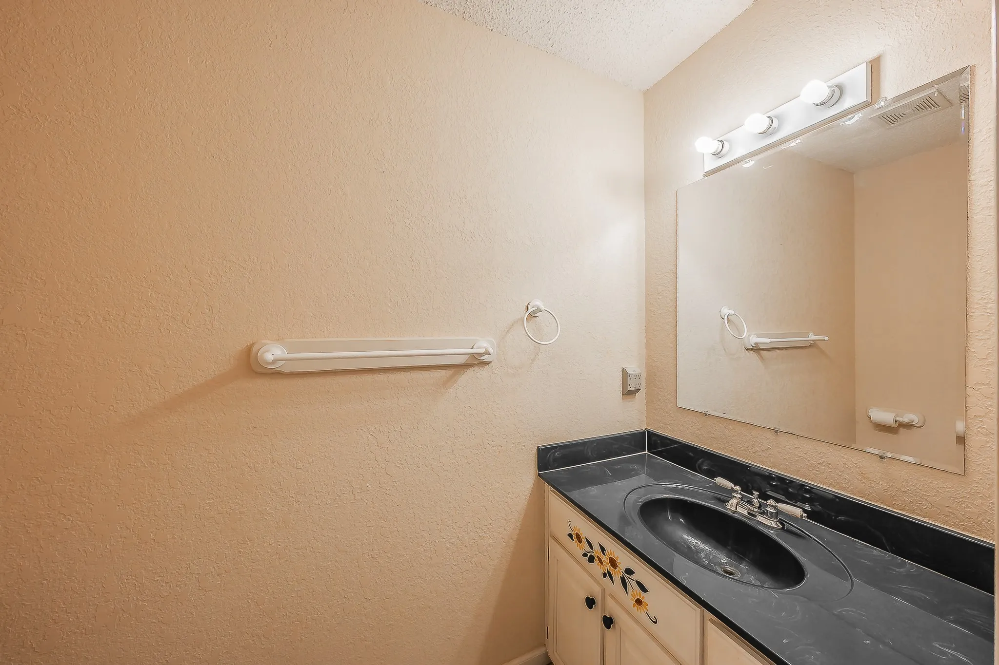 1/2 bath in downstairs second bedroom