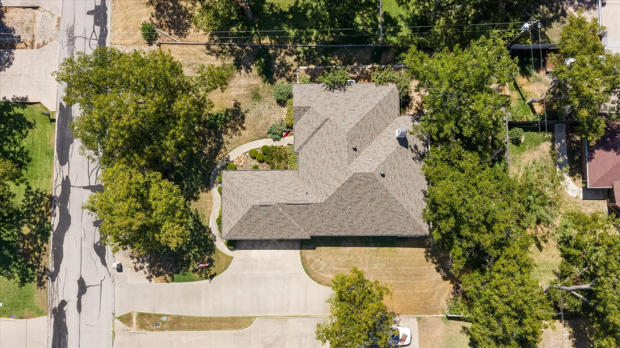 Asphalt shingle roofing with multiple gables