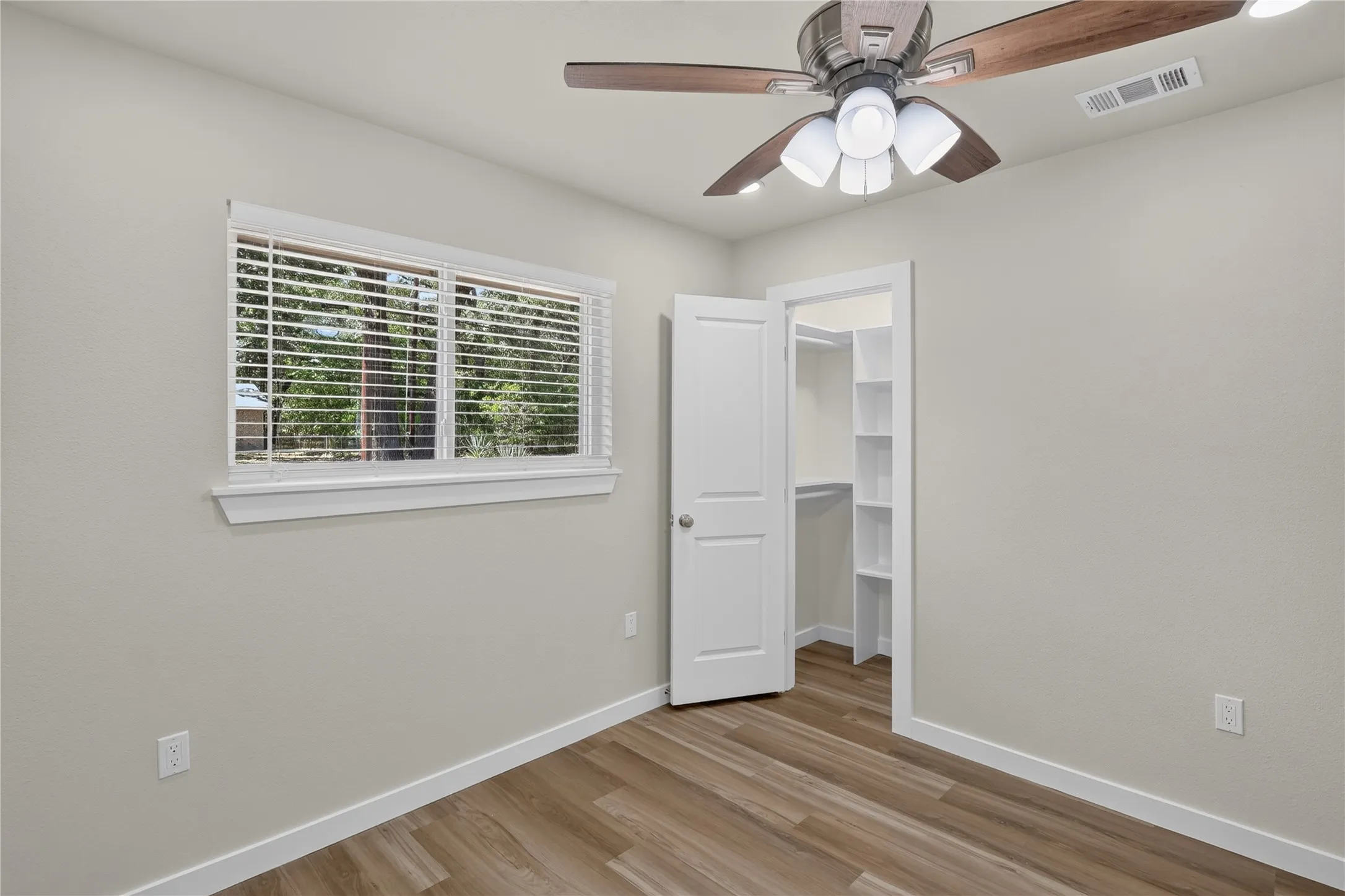 Wood-finish flooring with white trim