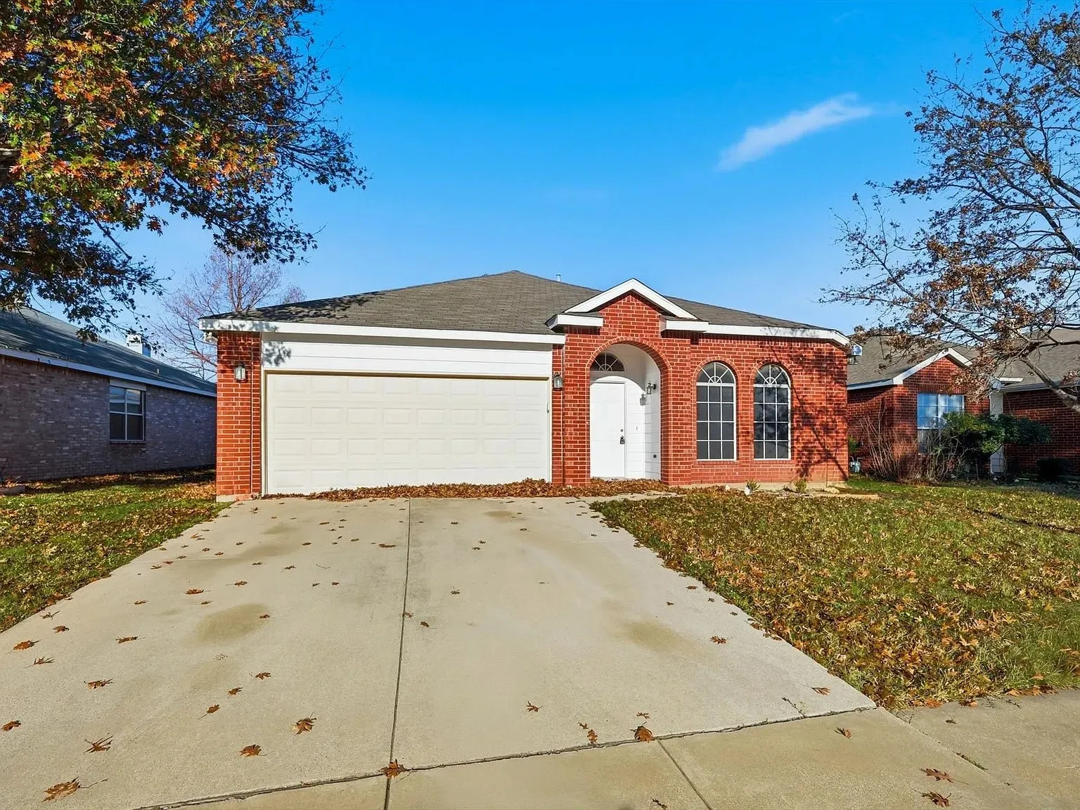 Red brick exterior with arched window details
