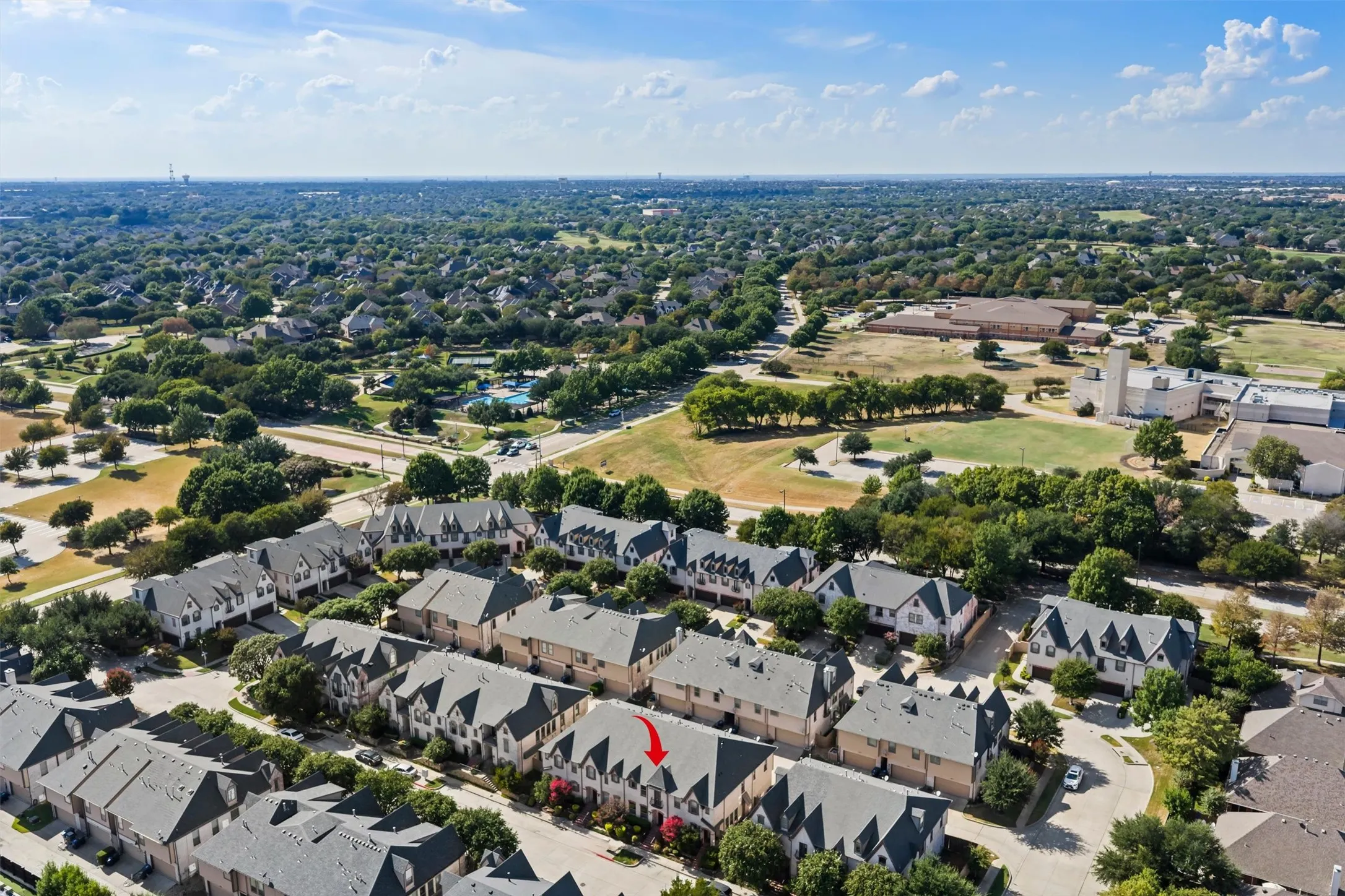 Aerial view showcasing the beautiful community, surrounding neighborhood, and convenient location. A great perspective of the community and its nearby amenities.