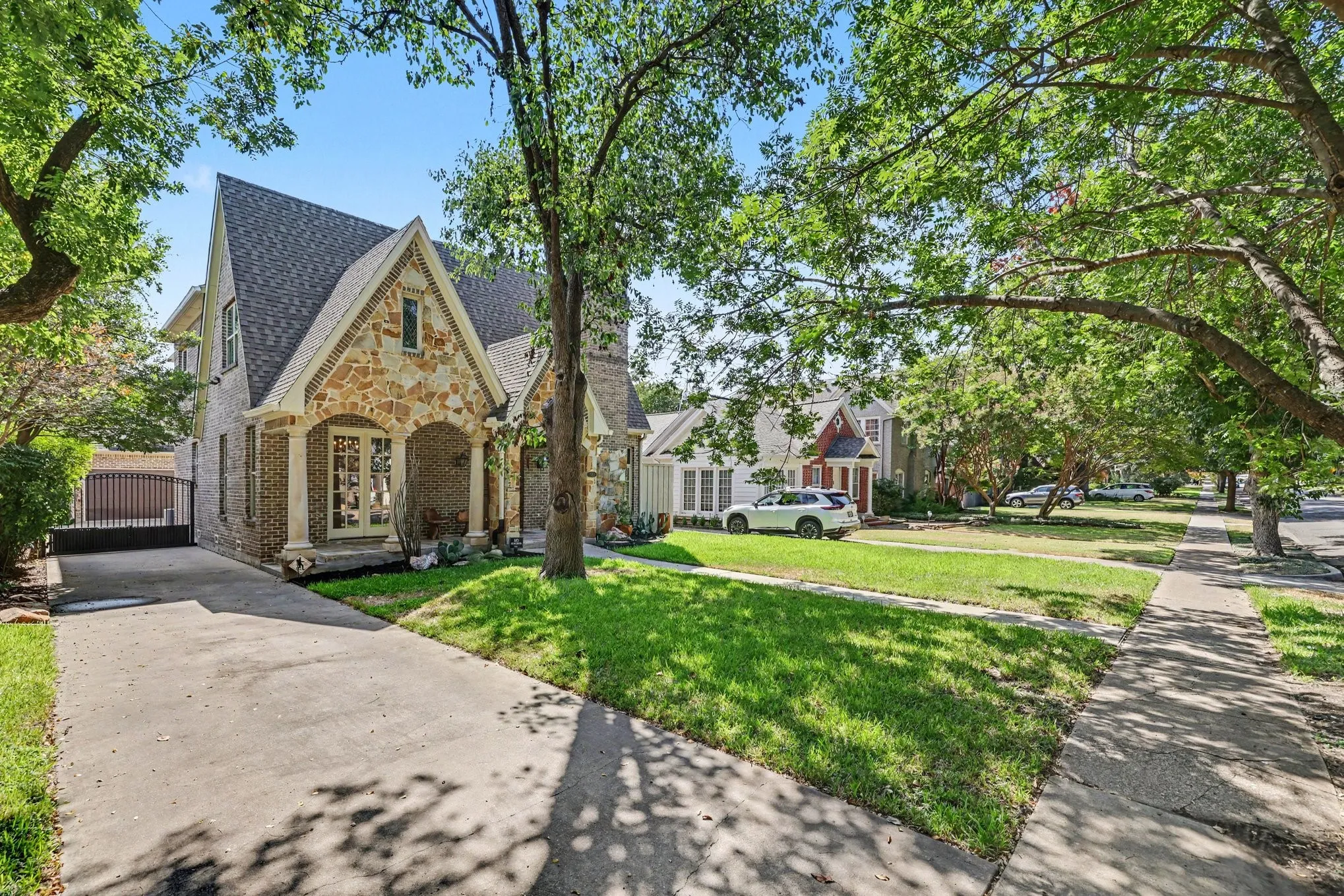 Stone and brick facade with gabled roofline