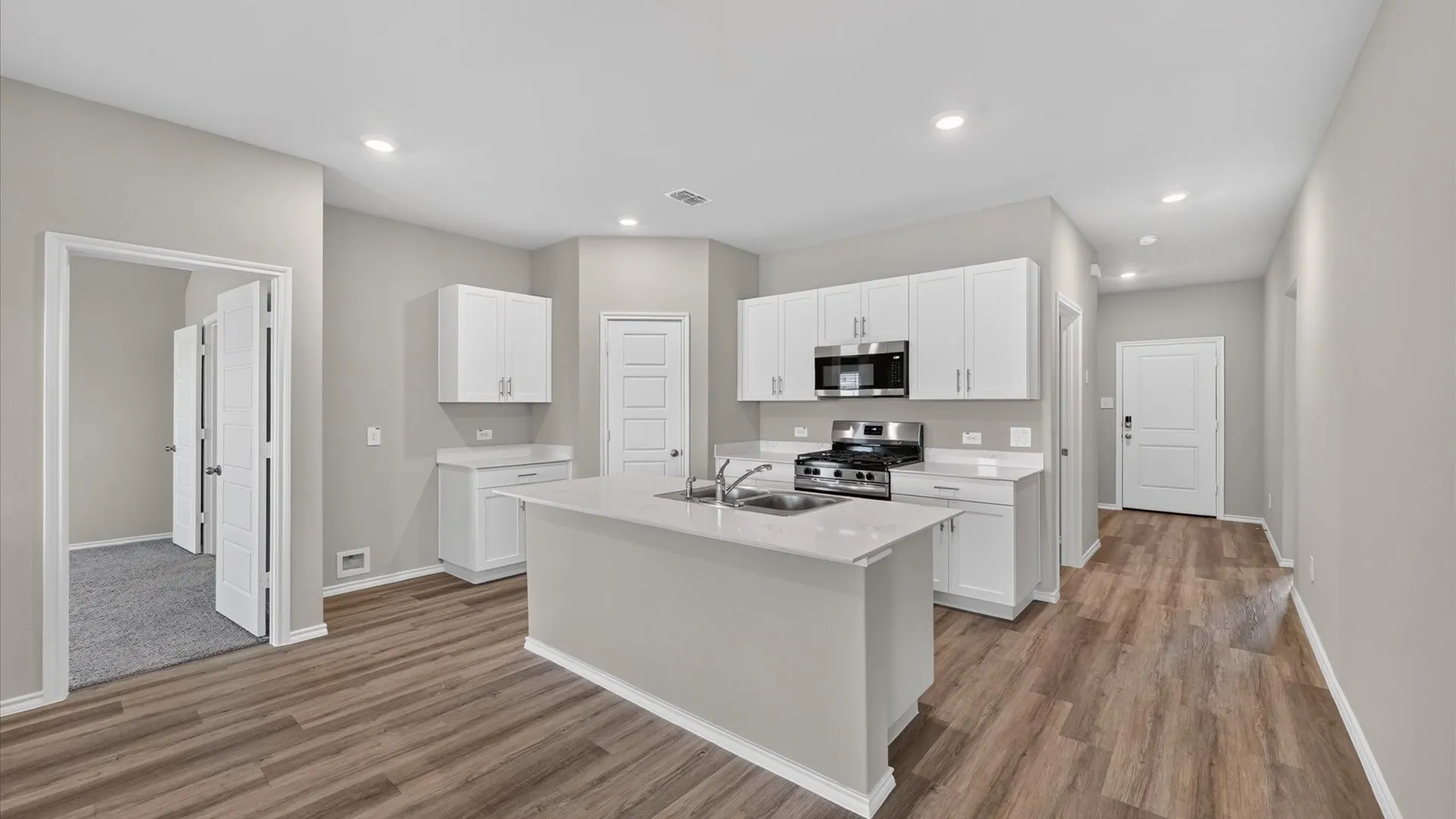 Kitchen - All Home and community information, including pricing, included features, terms, availability and amenities, are subject to change at any time without notice or obligation. All Drawings, pictures, photographs, video, square footages, floor plans, elevations, features, colors and sizes are approximate for illustration purposes only and will vary from the homes as built.

