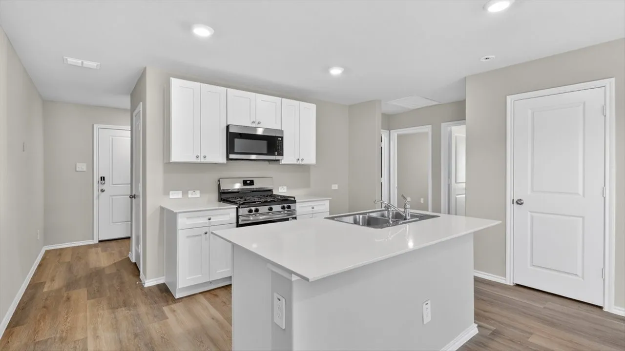 Kitchen-All Home and community information, including pricing, included features, terms, availability and amenities, are subject to change at any time without notice or obligation. All Drawings, pictures, photographs, video, square footages, floor plans, elevations, features, colors and sizes are approximate for illustration purposes only and will vary from the homes as built.
