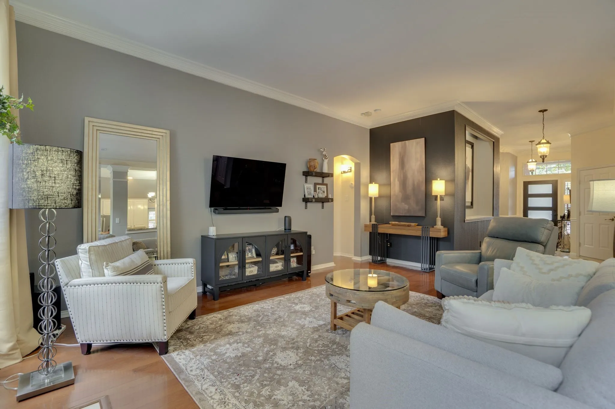 Hardwood flooring throughout the living area