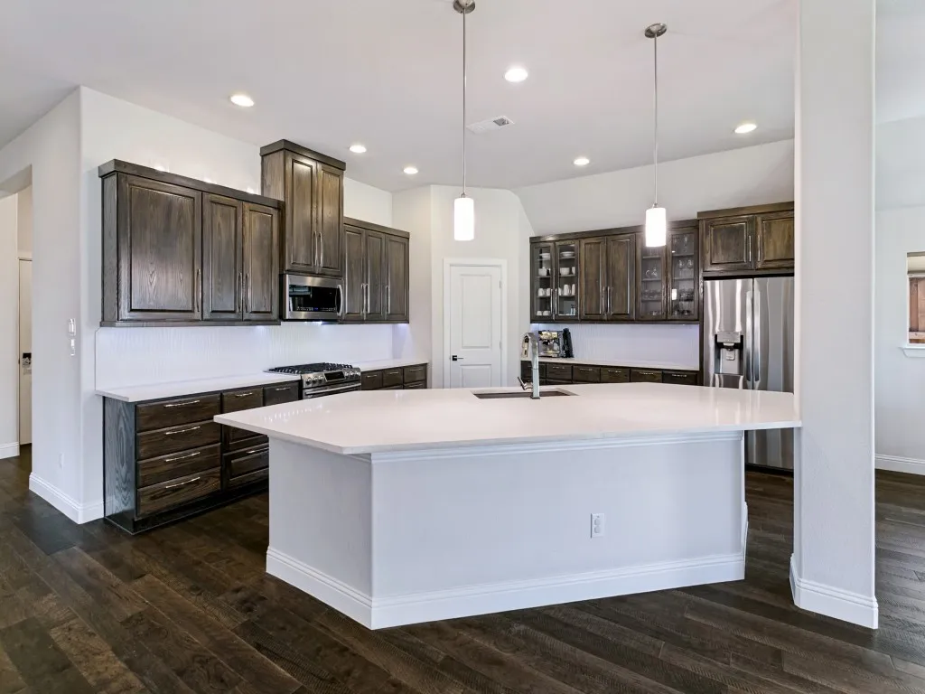 Expansive Island with Pendant Lighting