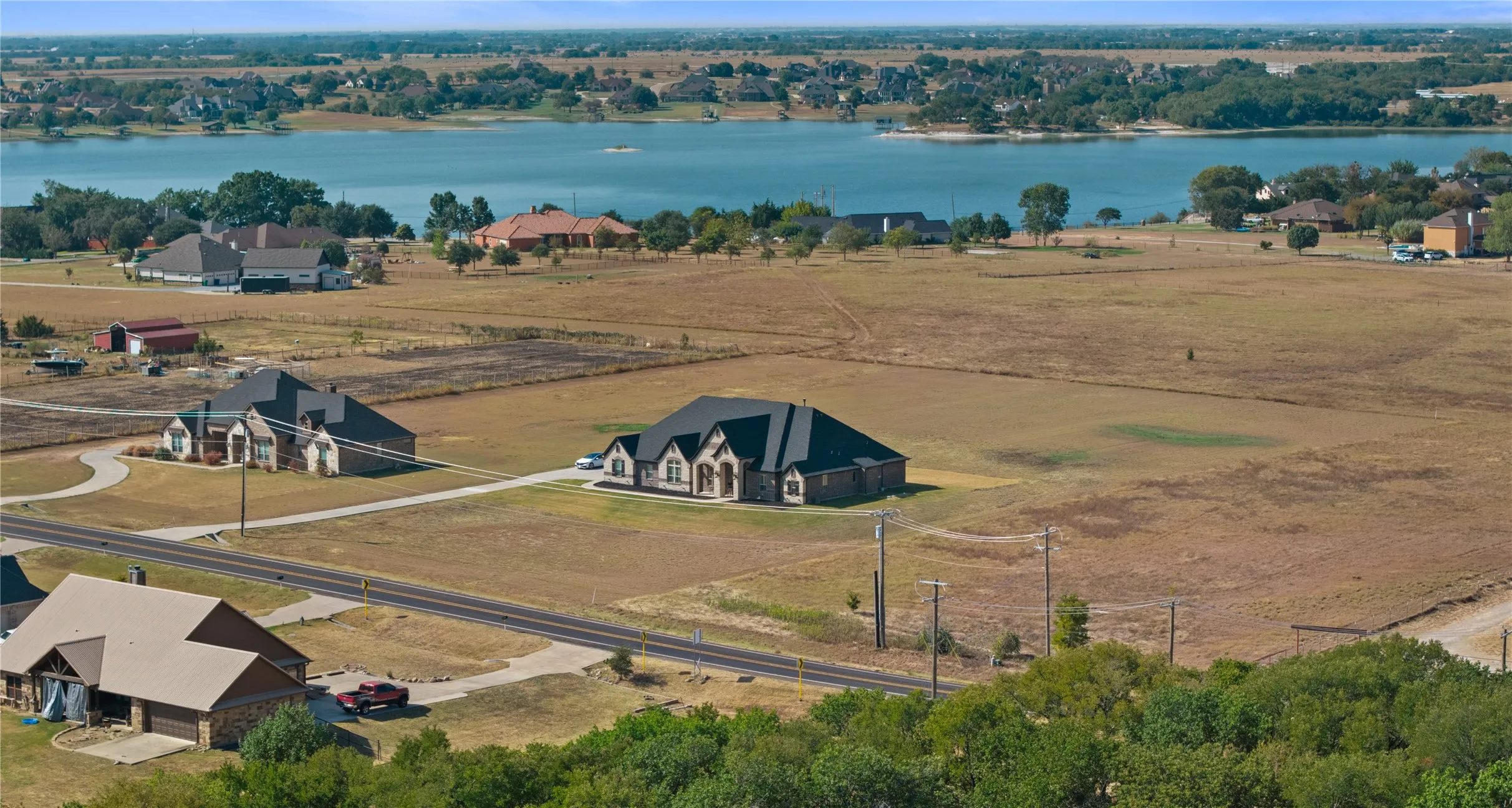 Expansive lot with a lake backdrop