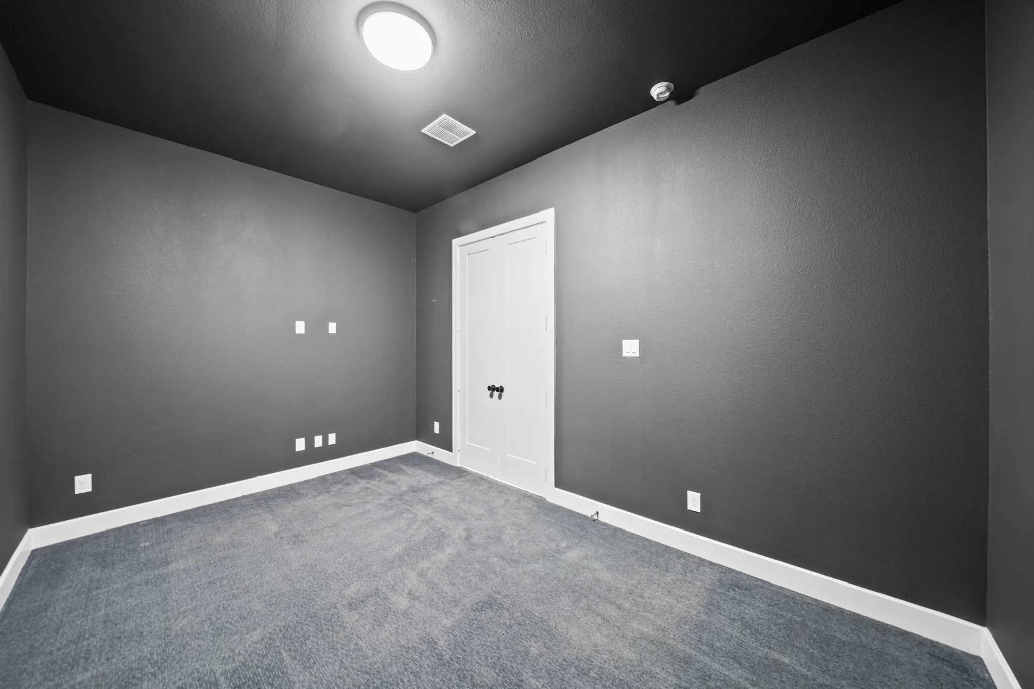Textured gray walls with white trim