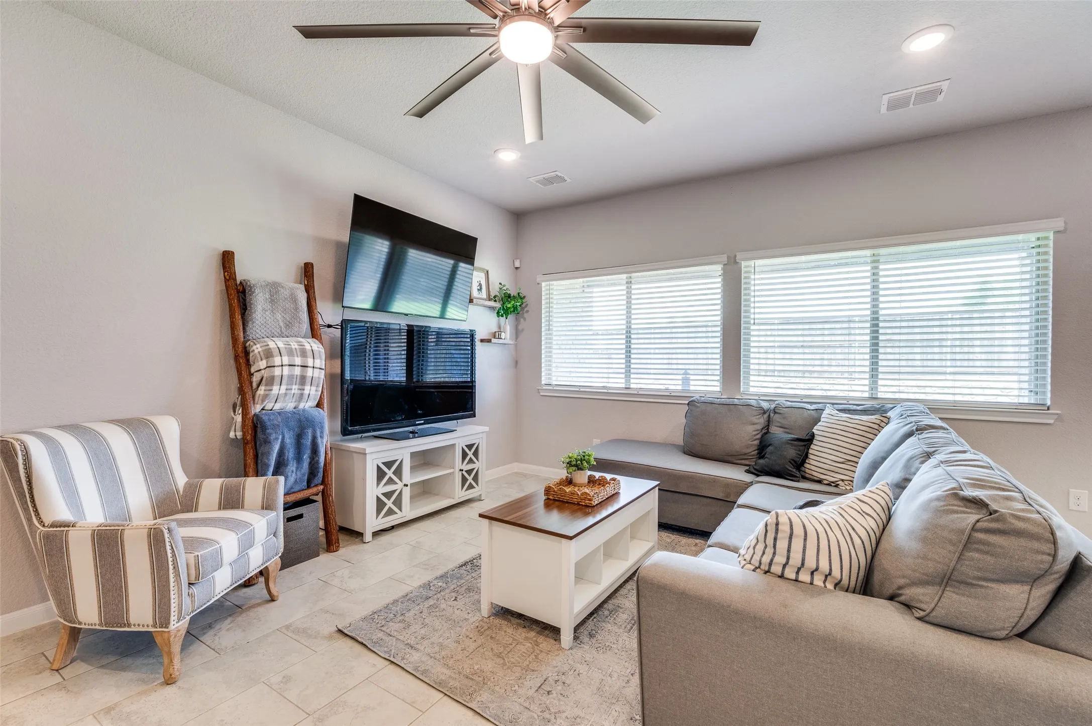 Recessed lighting and ceiling fan overhead
