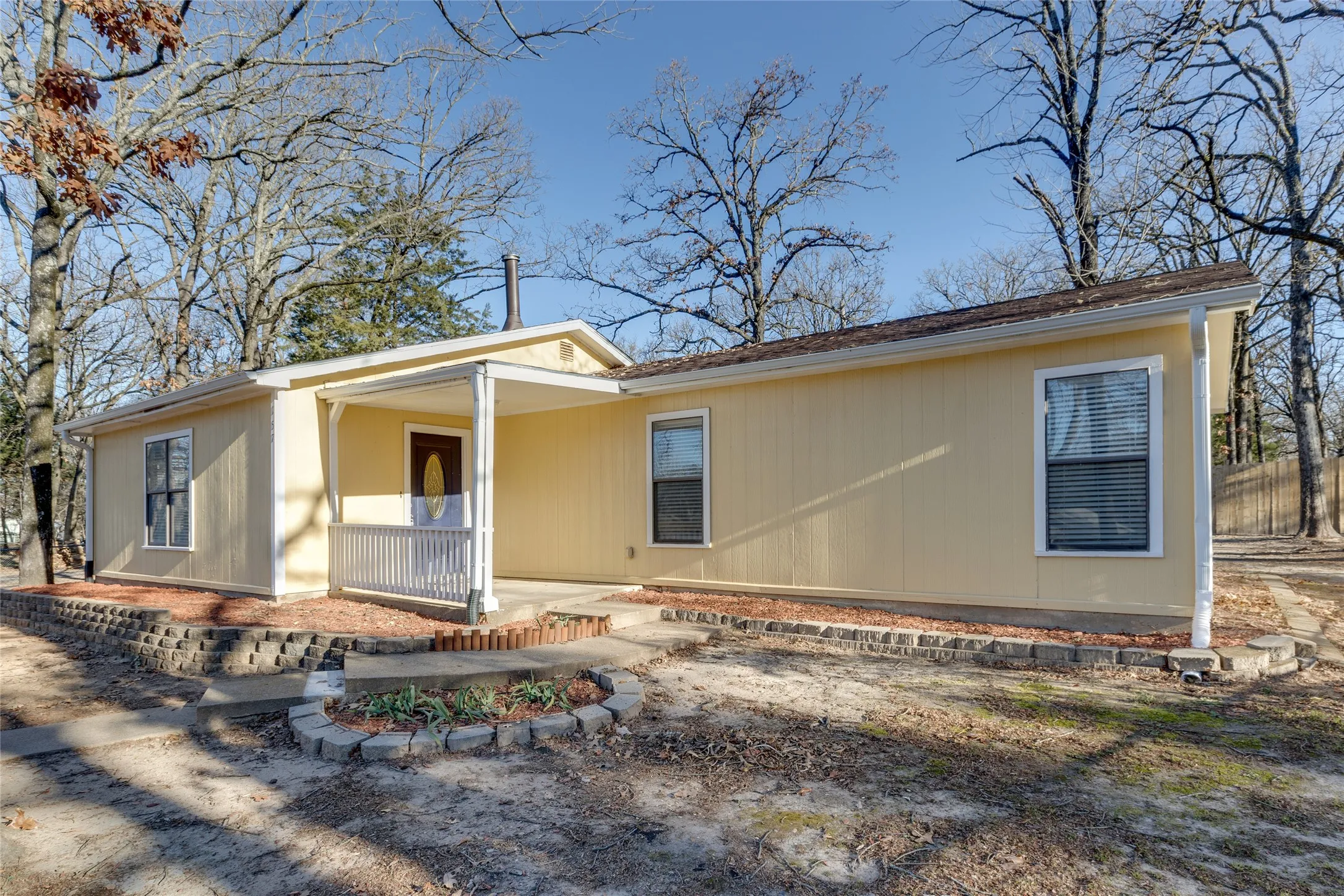 View of front of house featuring covered porch