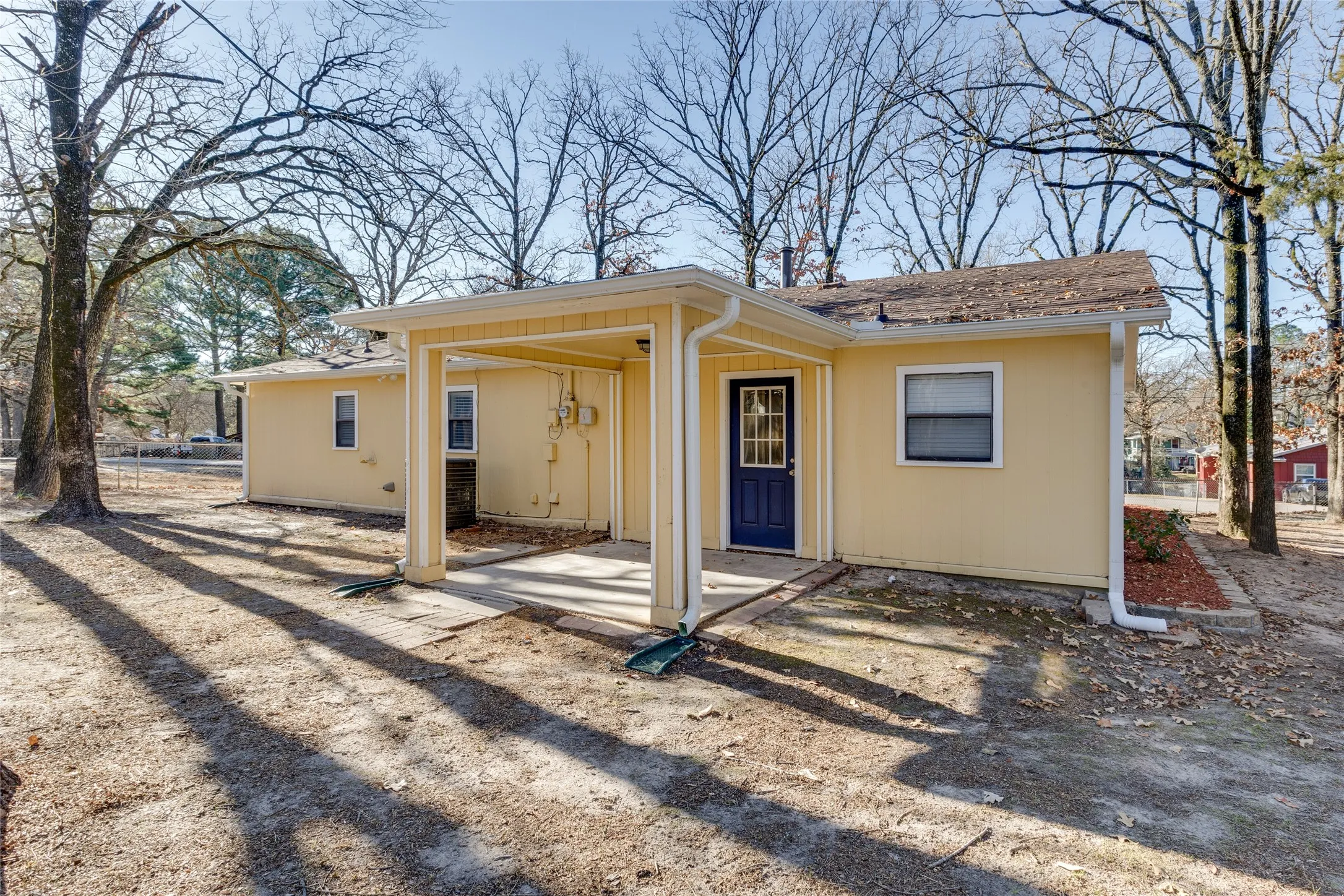 Rear view of house with a patio