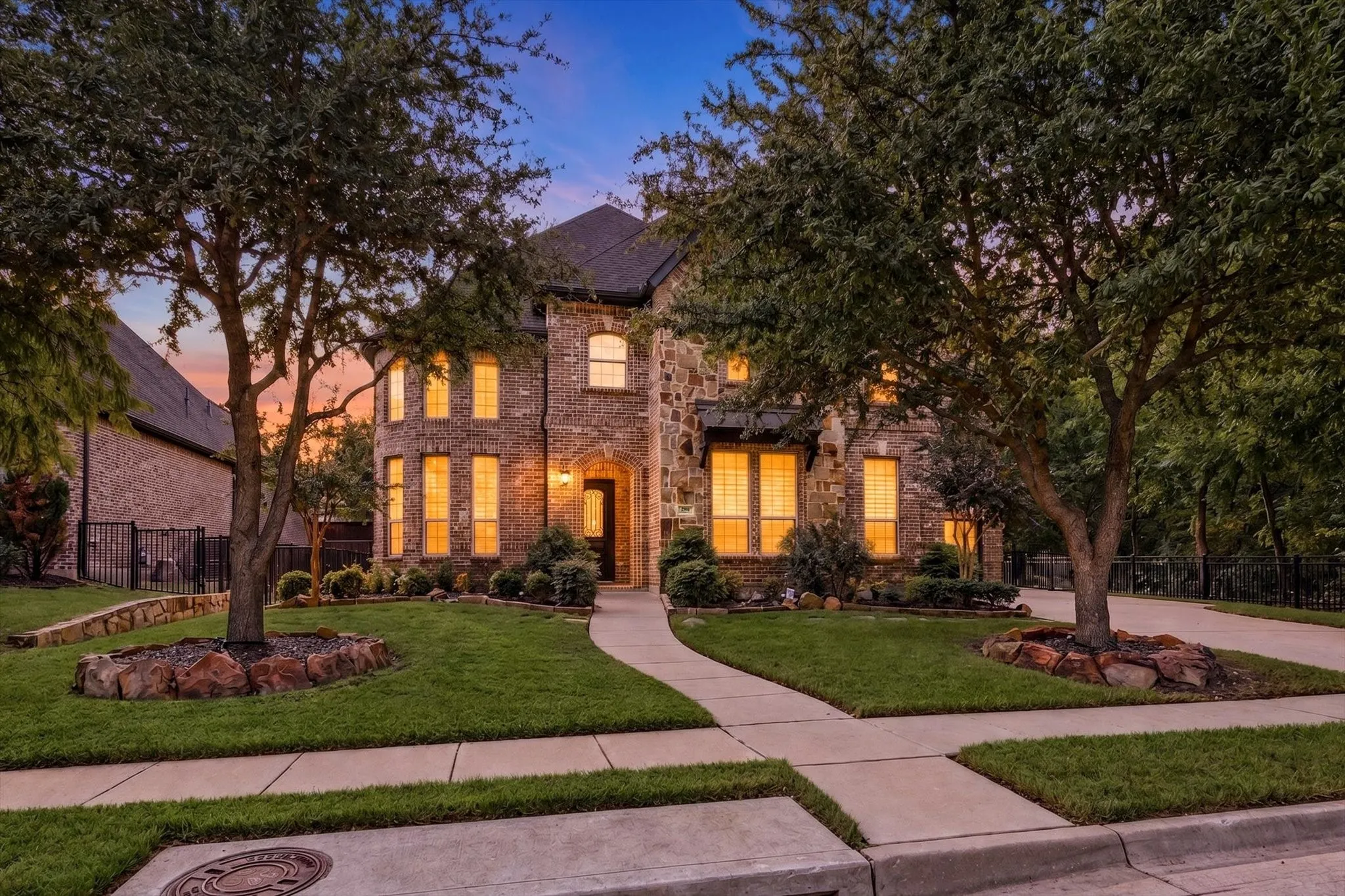 Brick and stone exterior with arched entry
