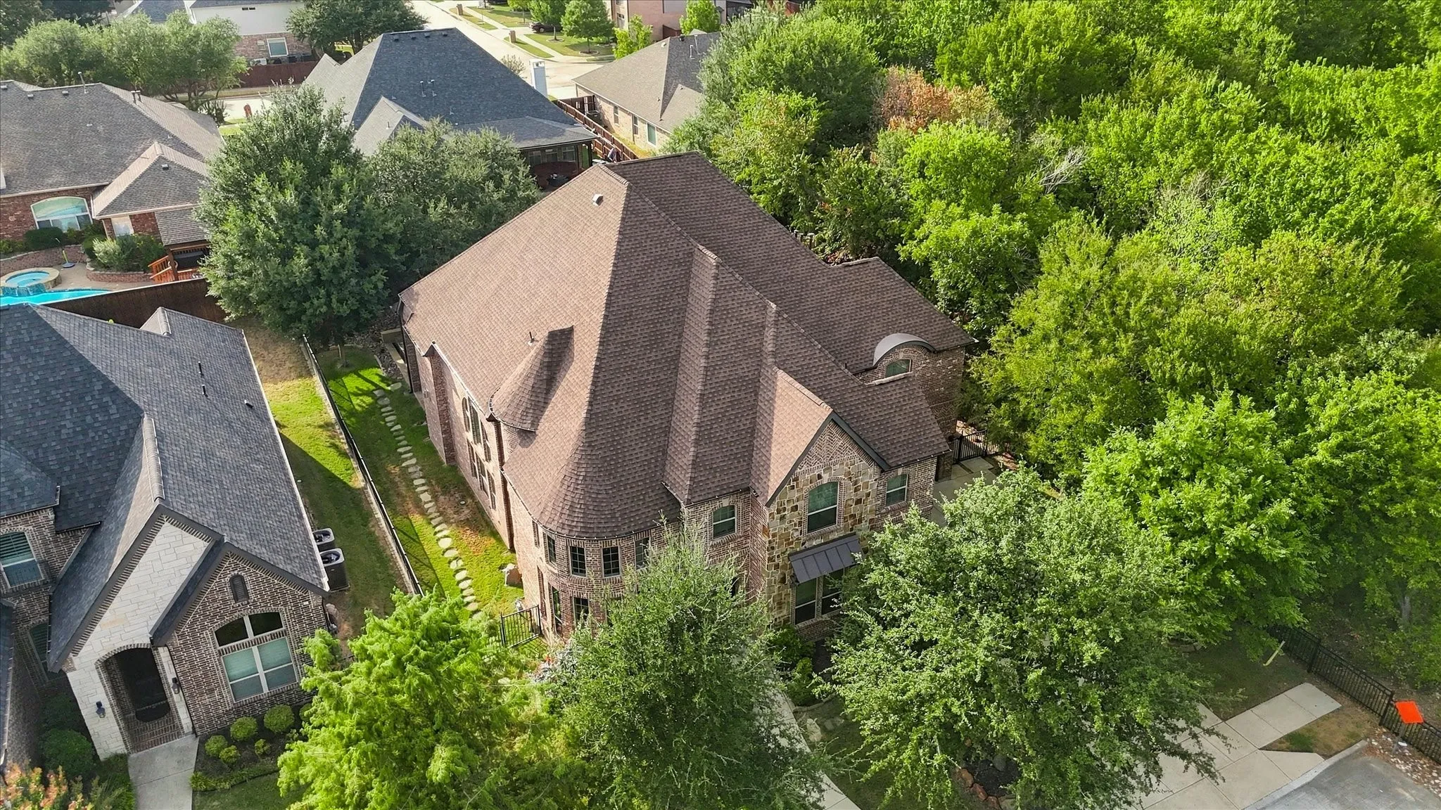 Stone and brick exterior with a multi-gabled roof