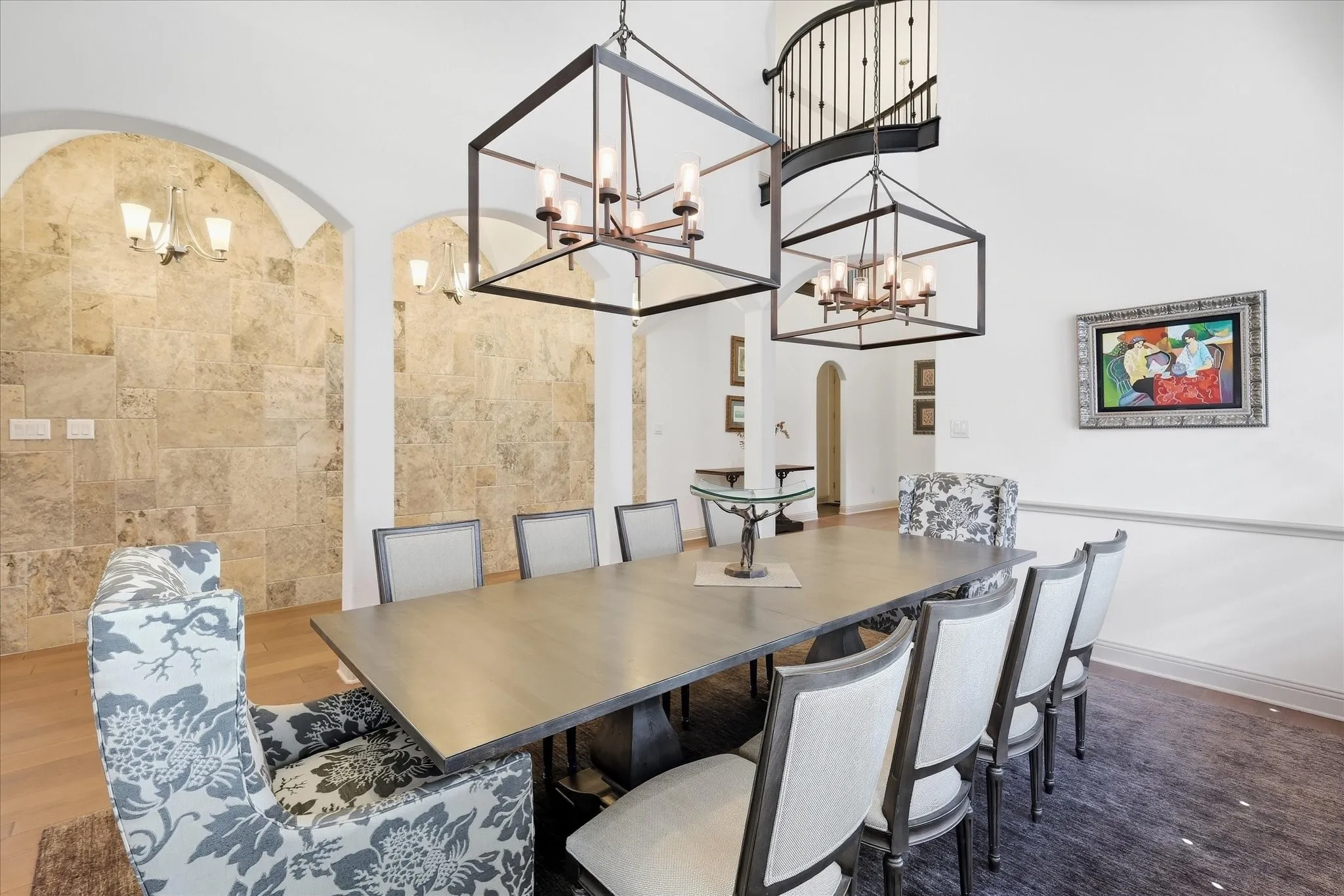Soaring ceiling height with a curved staircase