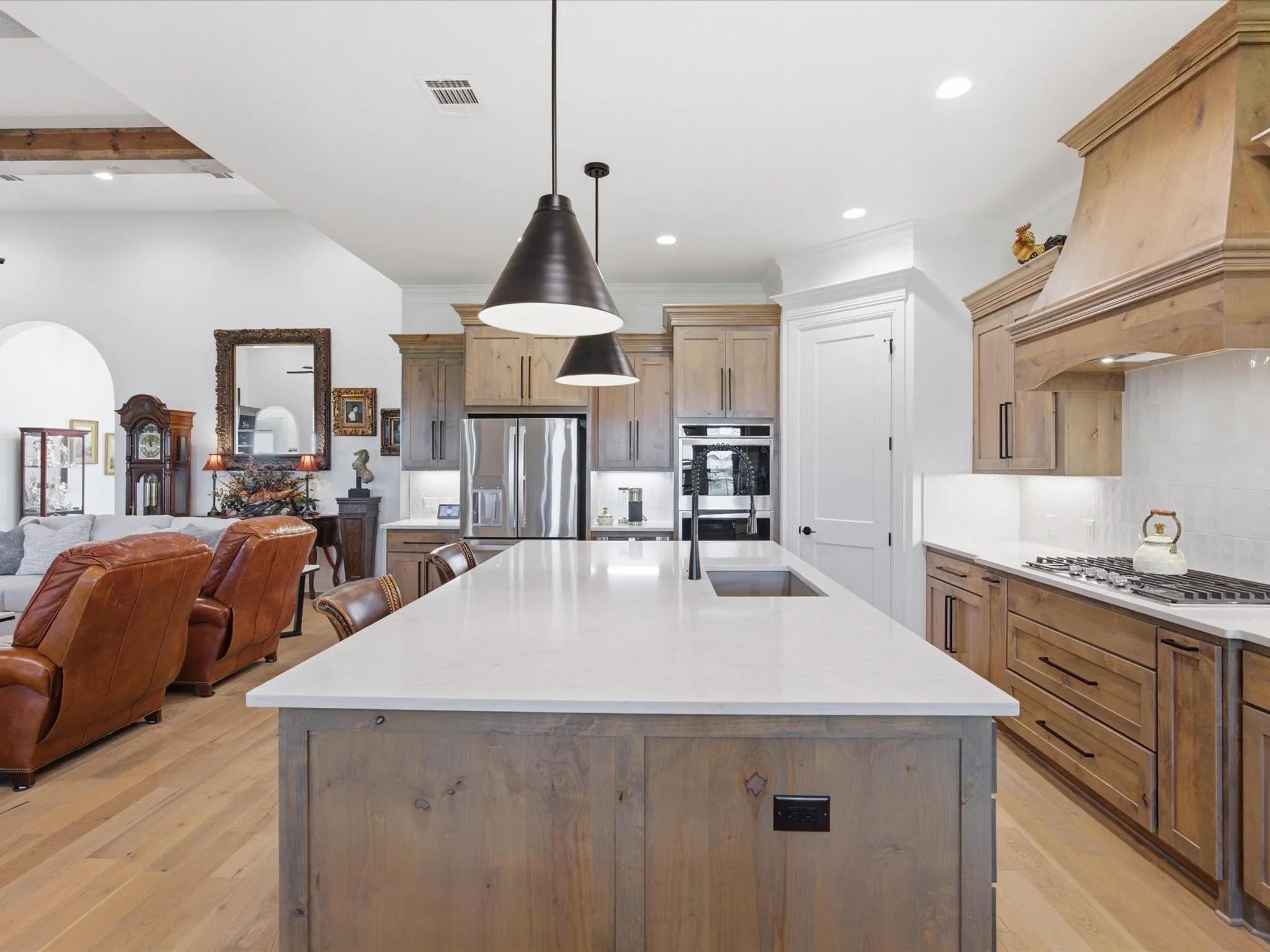 The kitchen has plenty of storage with ample cabinets and walk-in pantry.