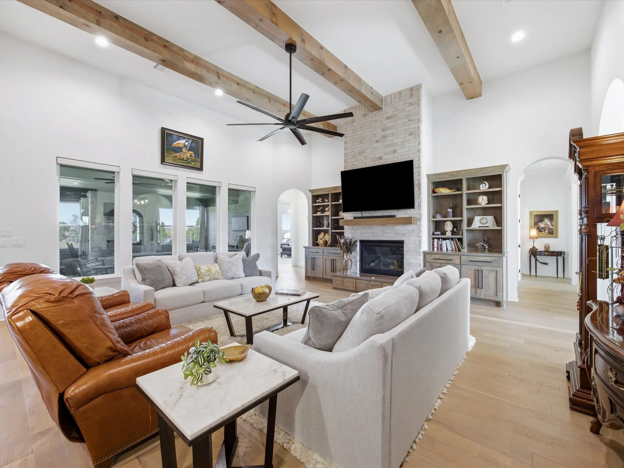 Gather around the warm floor to ceiling gas fireplace.