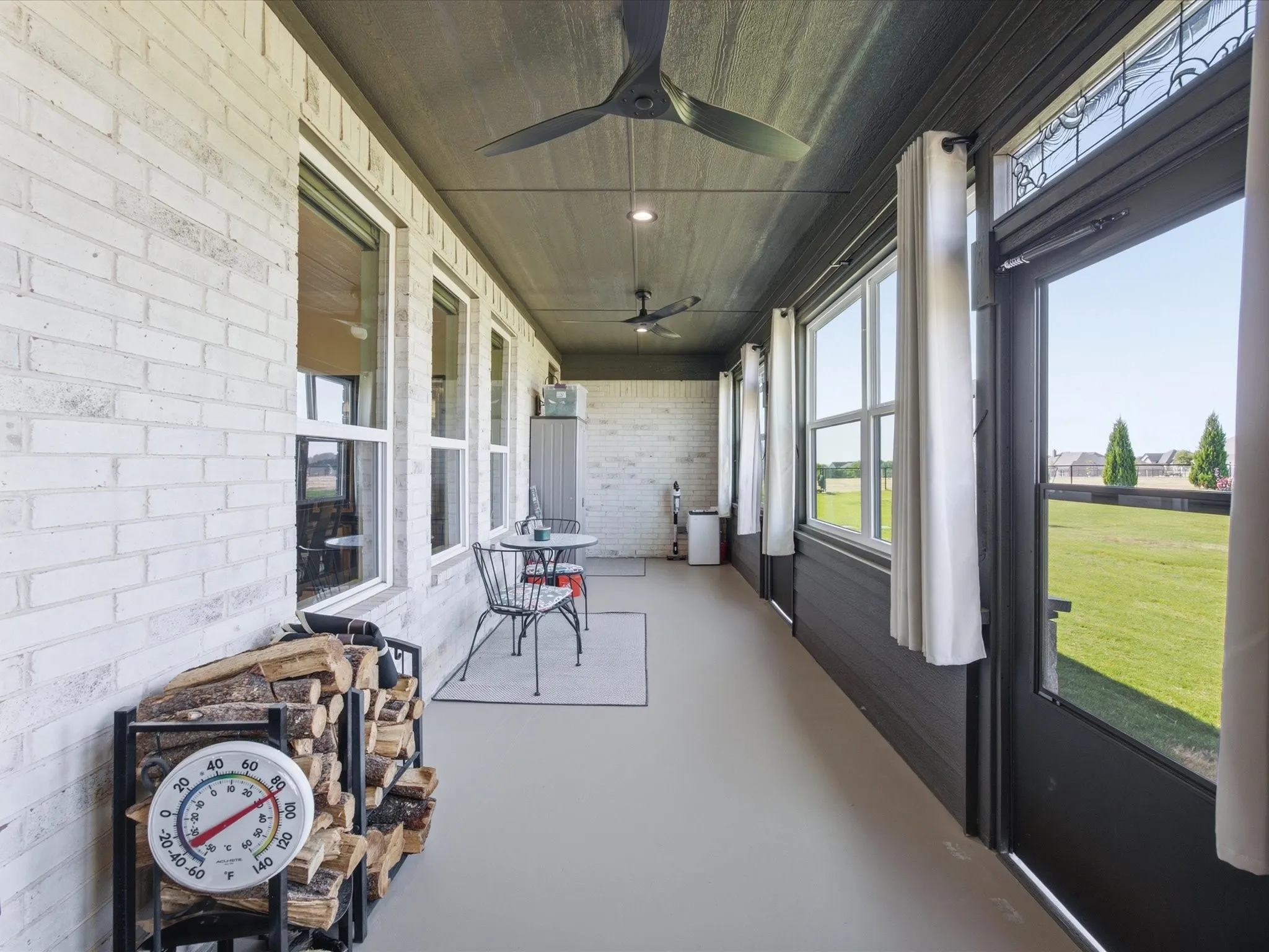 Enjoy relaxing on your enclosed back patio with a peaceful view of your spacious lot.