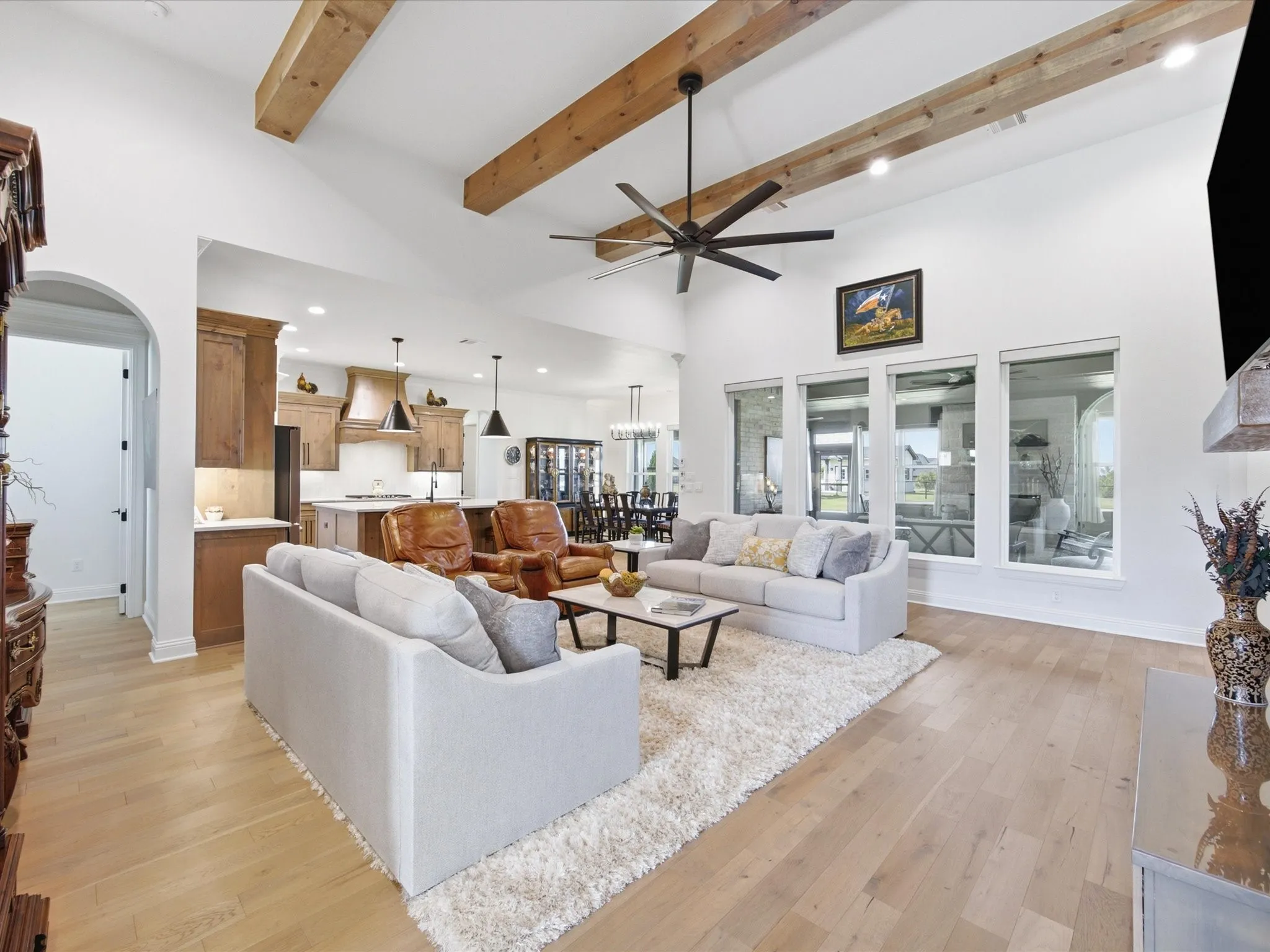 Open sight-lines flow into the kitchen and dining area.