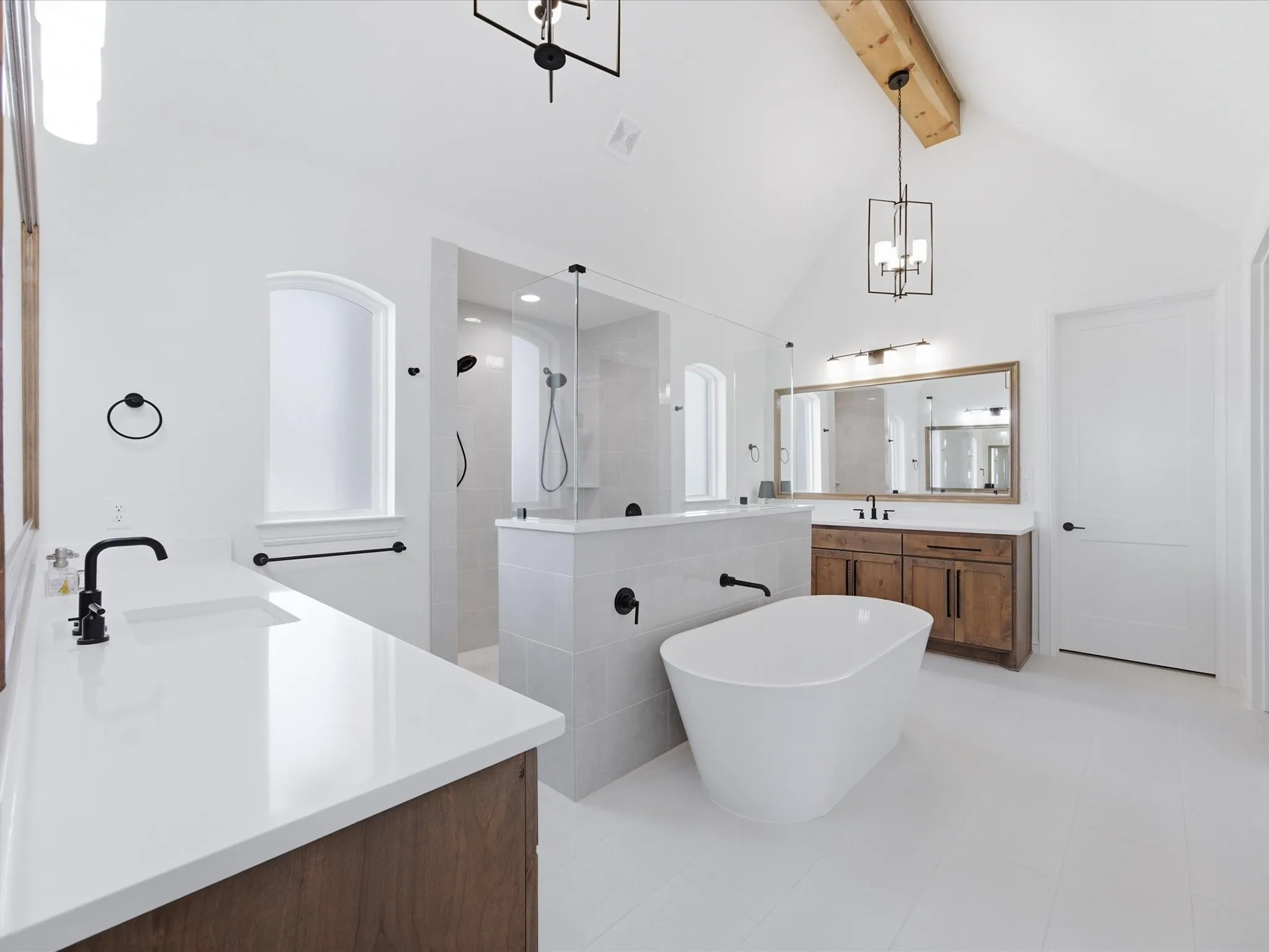 Relax and unwind in the light filled primary ensuite bath
