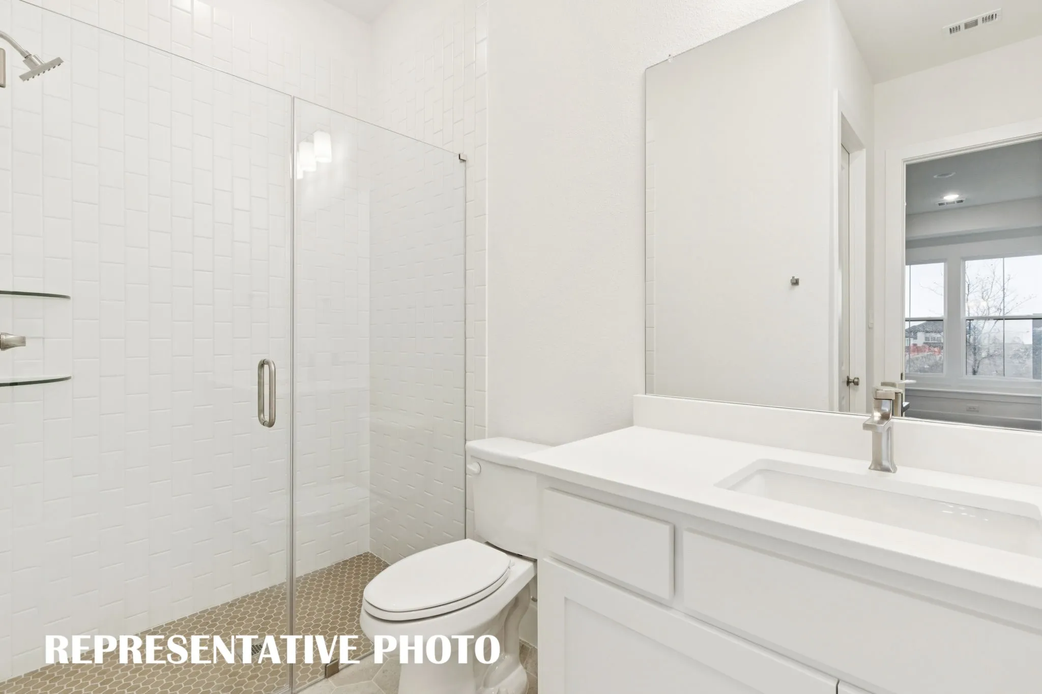 Friends and family will feel right at home in any of the beautifully finished guest baths offered in our Reese plan.  REPRESENTATIVE PHOTO