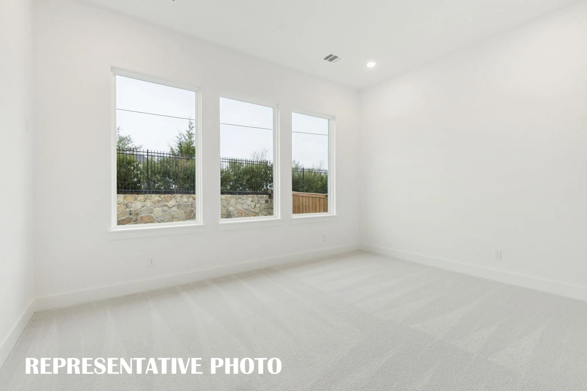 The entire family will enjoy getting together for family movie night in this wonderful media room!  REPRESENTATIVE PHOTO